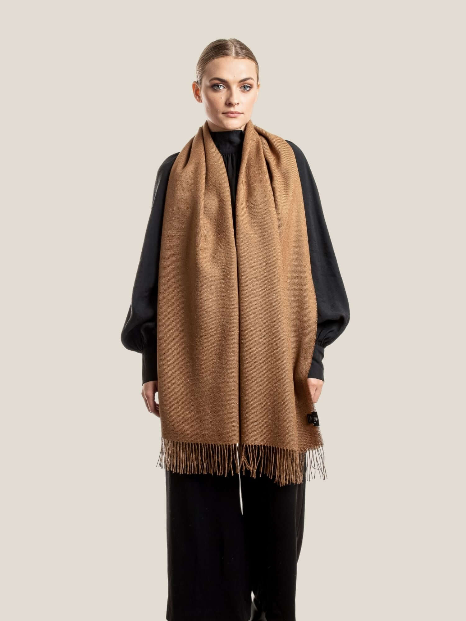 Camel Brown Premium wool shawl worn as everyday accessory showing versatile styling