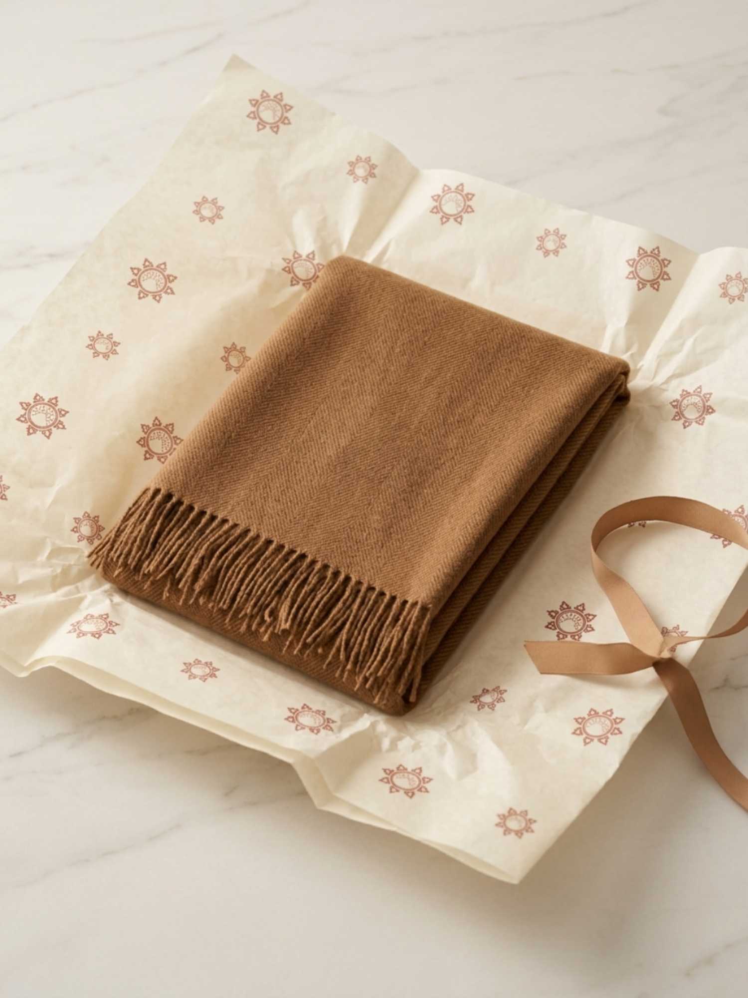 Camel baby alpaca shawl folded in Orange Inca branded gift packaging | Orange Inca
