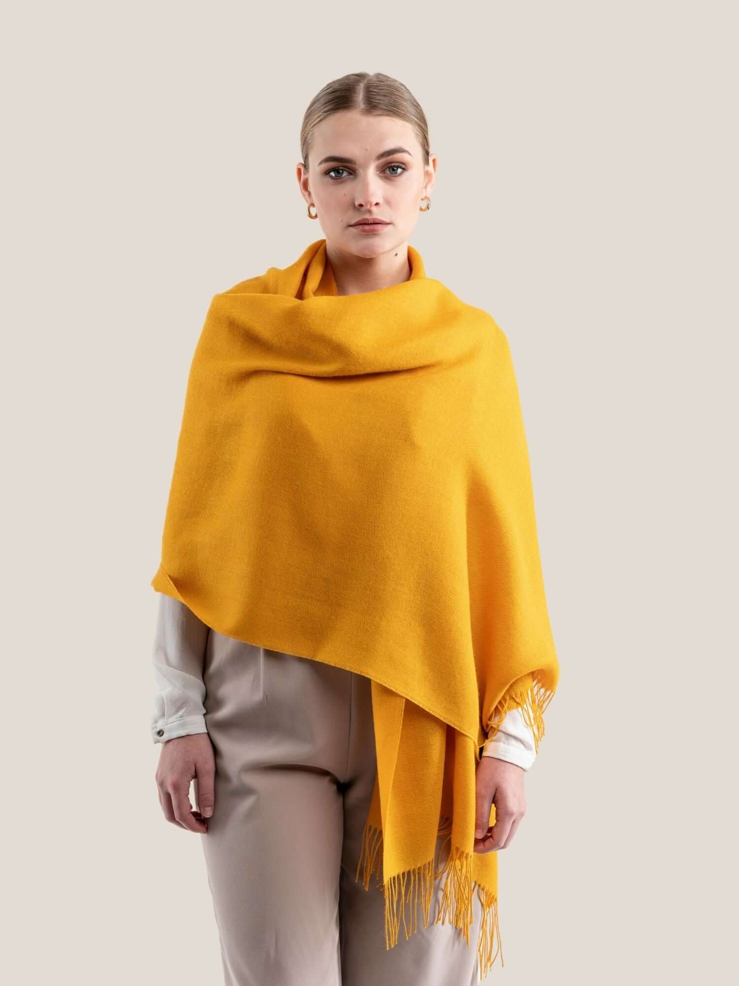 Yellow Premium wool shawl worn as everyday accessory showing versatile styling