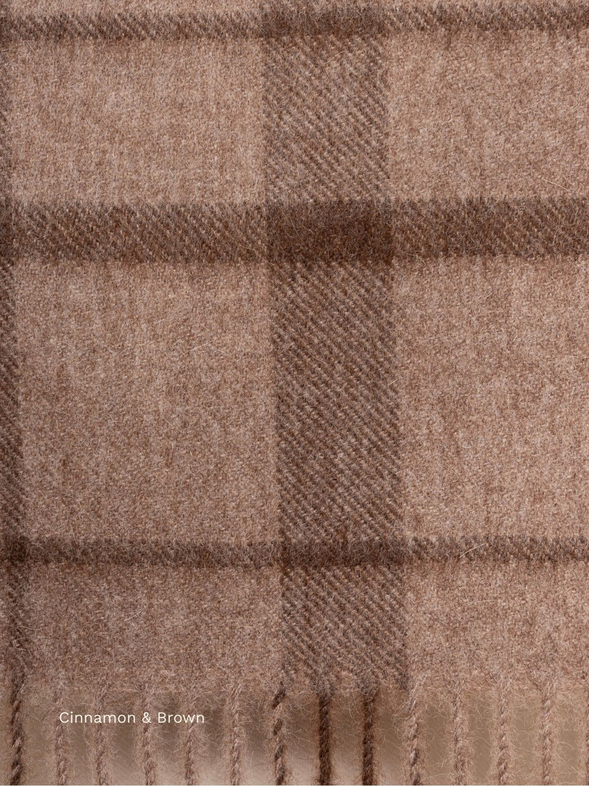 Cinnamon and brown plaid baby alpaca scarf, close-up of the brown check pattern and fringe