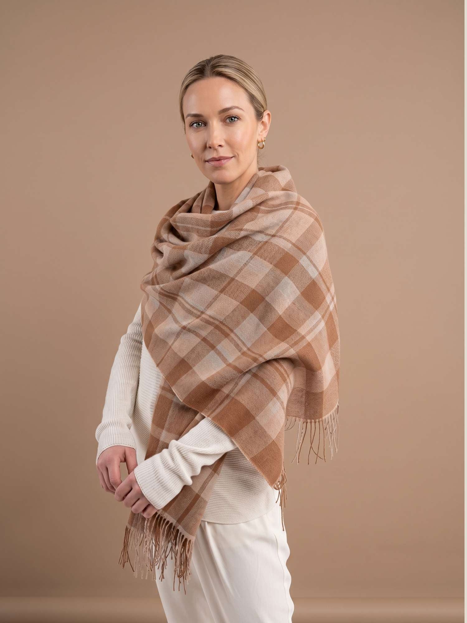 Camel and beige plaid baby alpaca shawl worn as a wrap – draped around shoulders, softer than cashmere | Orange Inca