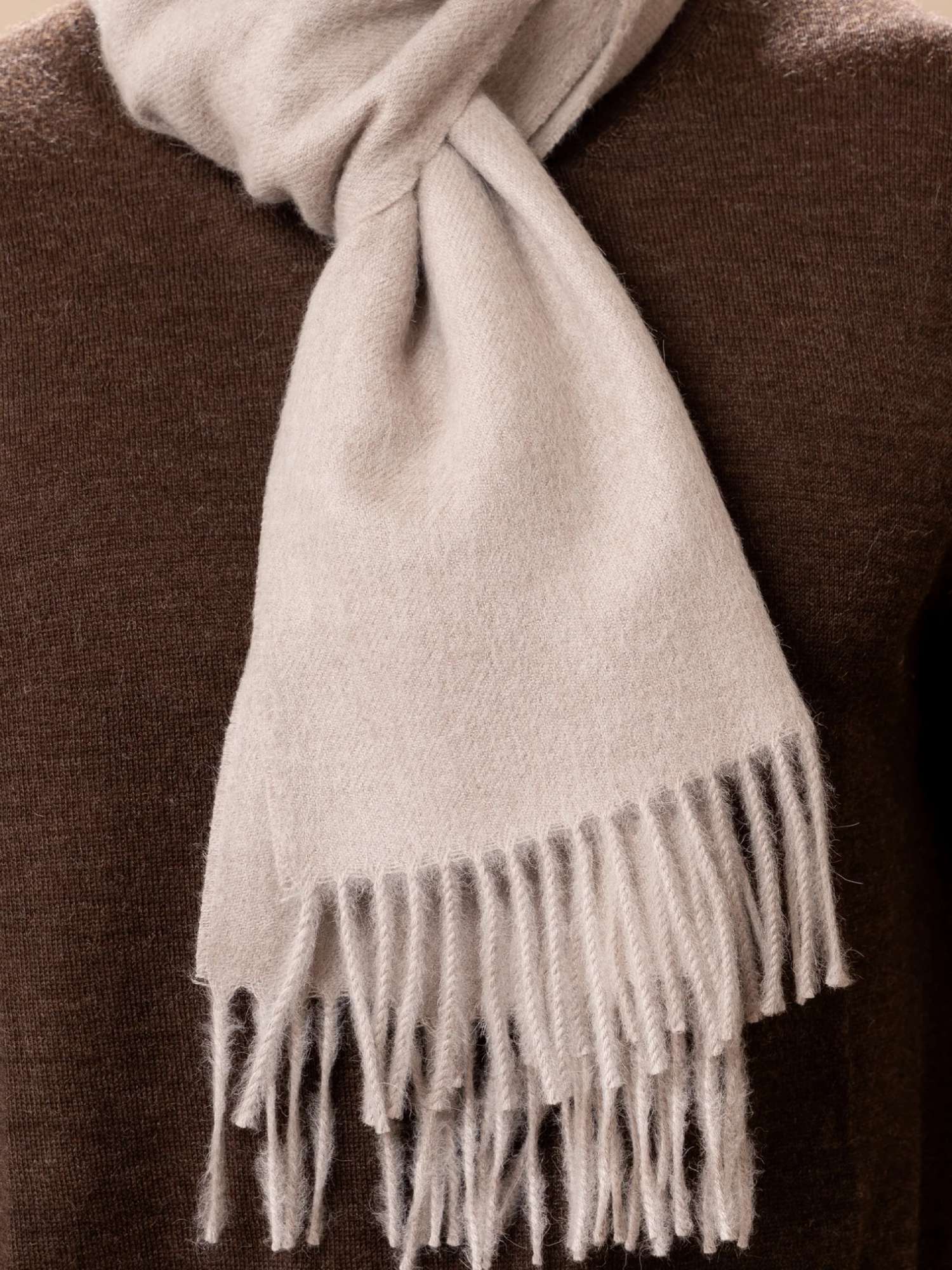 Close-up texture of oatmeal baby alpaca scarf — undyed natural alpaca fibre, fringed ends | Orange Inca