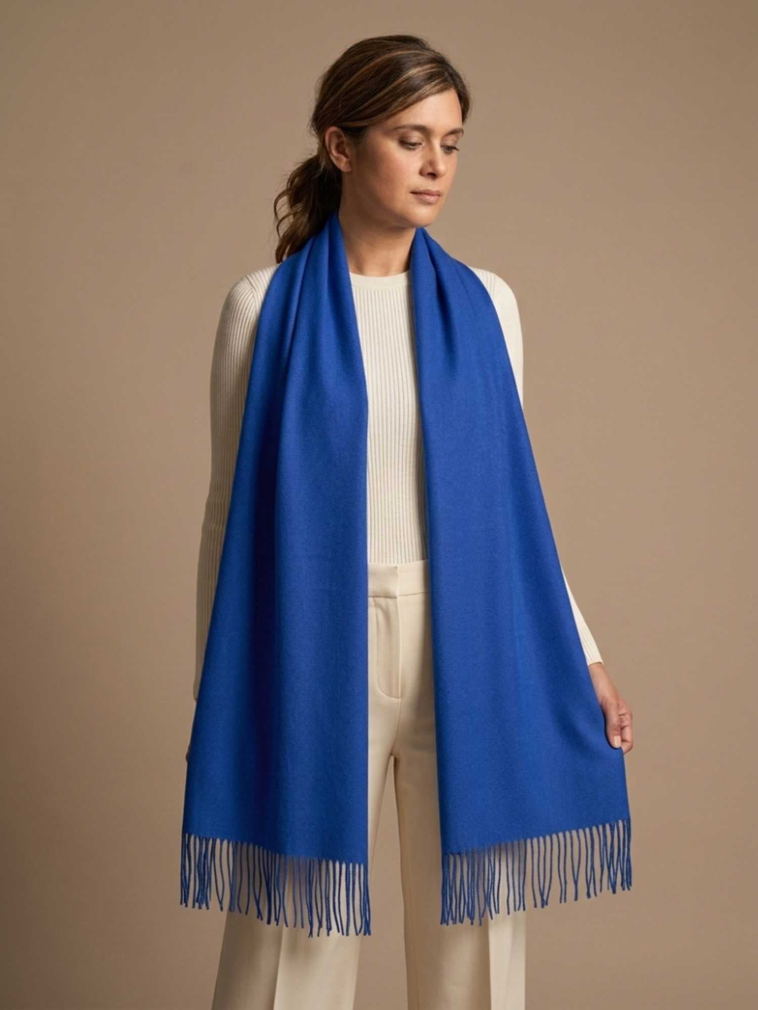 Blue baby alpaca shawl worn open over shoulders – versatile year-round styling | Orange Inca