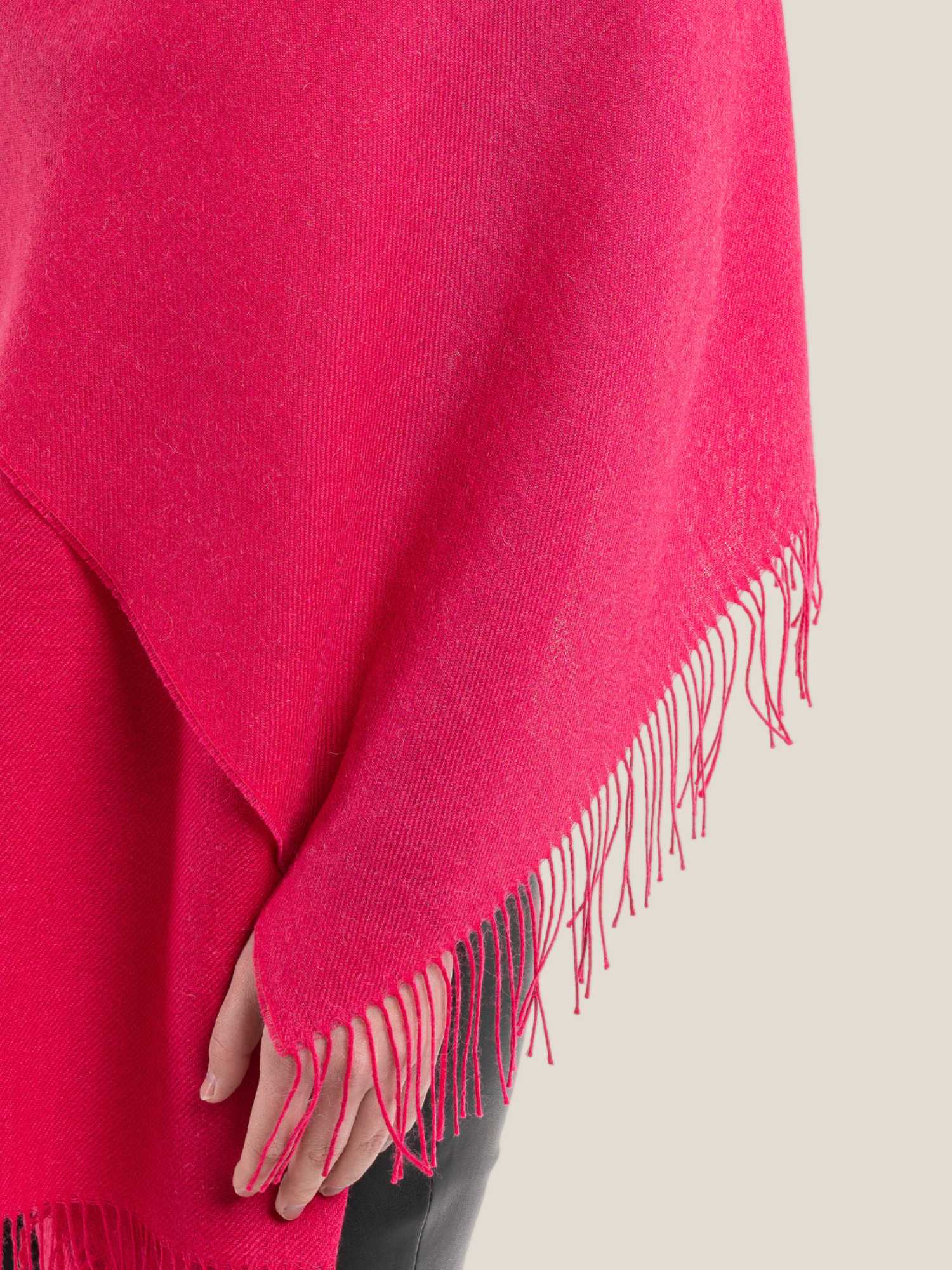 Fuchsia baby alpaca shawl worn – mid-body wrap detail with fringe edge | Orange Inca