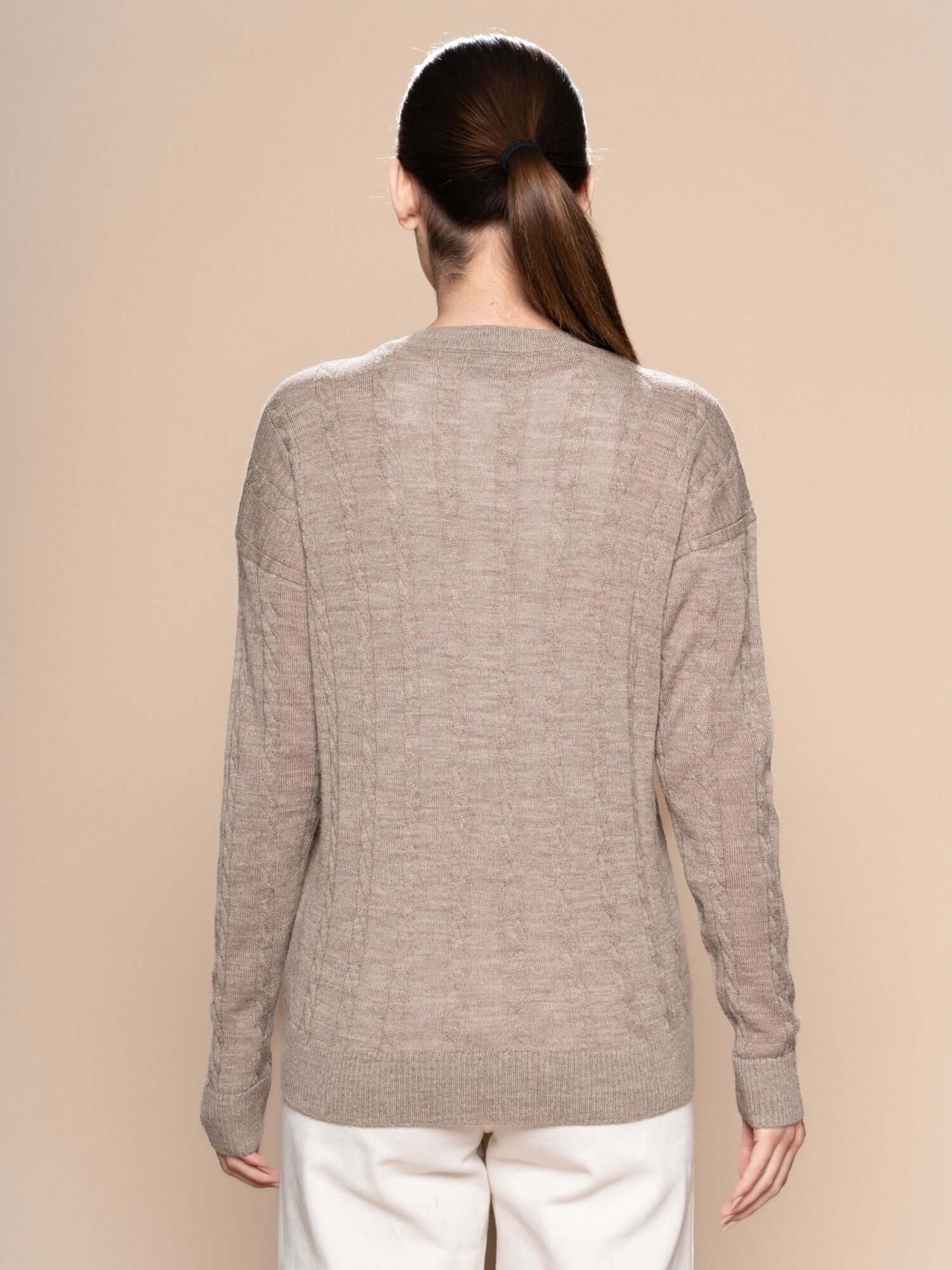Back view of cinnamon braided baby alpaca jumper – cable knit natural knitwear | Orange Inca