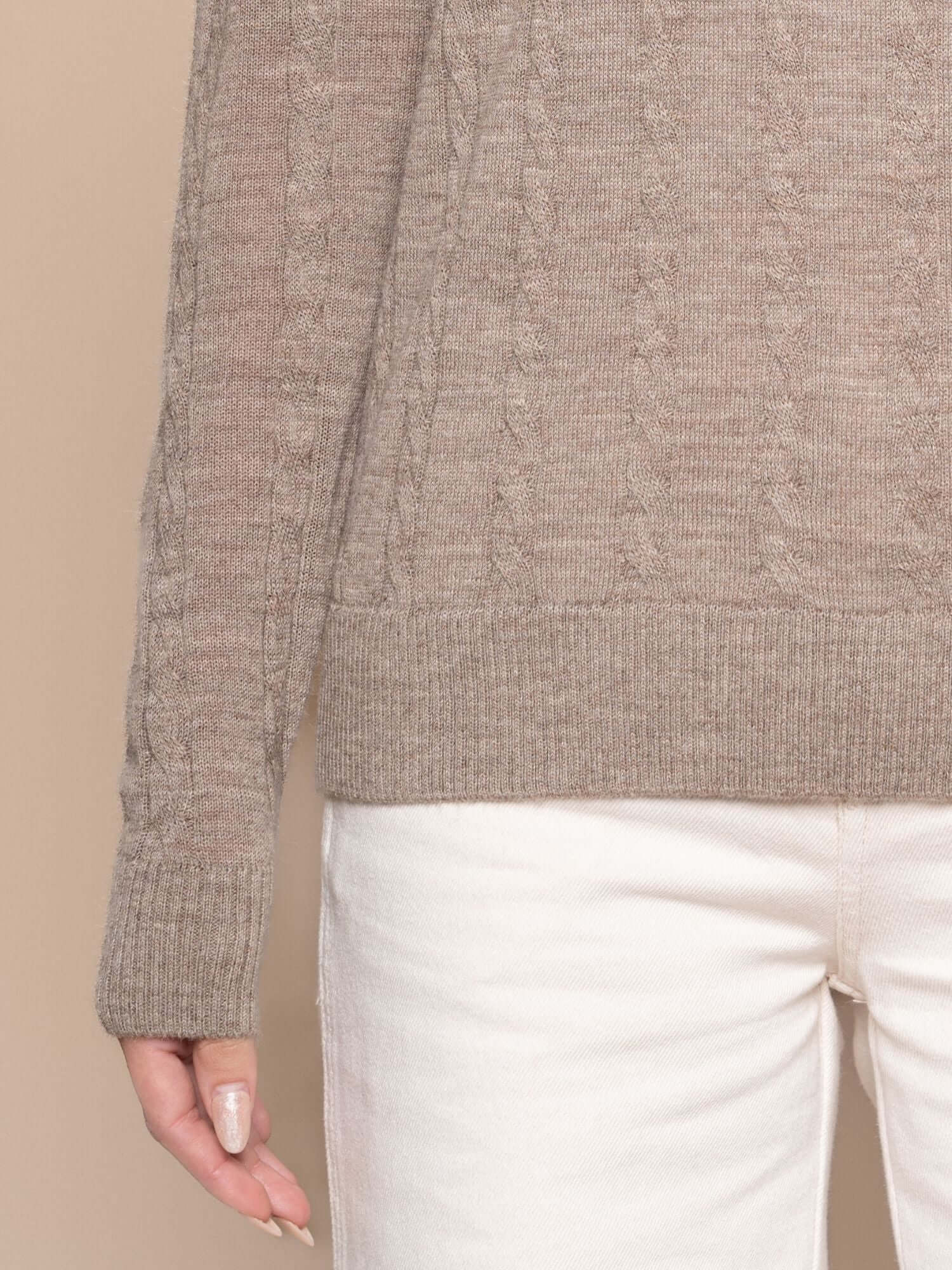 Close-up of cable knit pattern on cinnamon baby alpaca jumper sleeve | Orange Inca