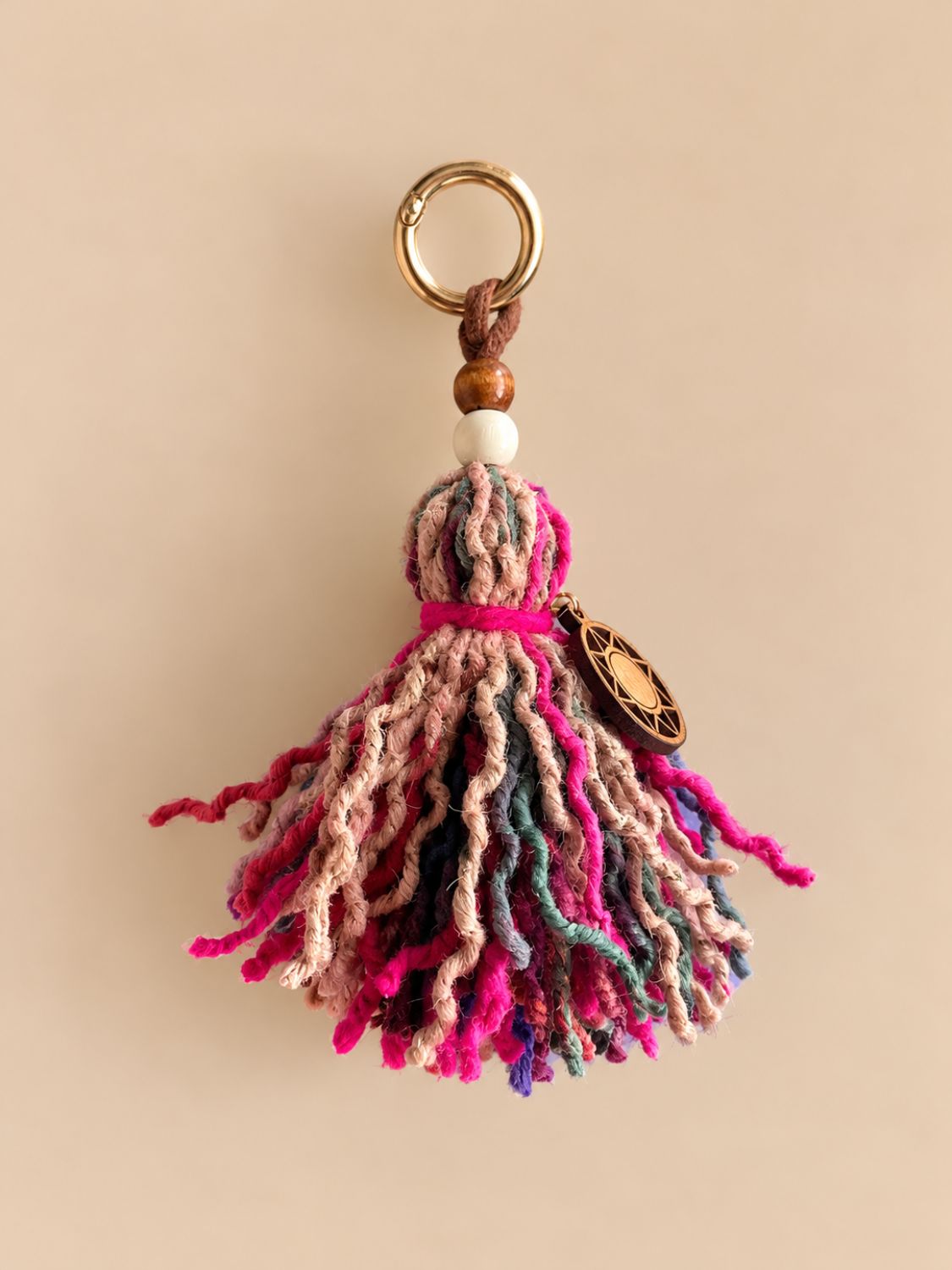 Classic wool bag charm and keychain in pink, grey and magenta with a light gold ring and wooden sun charm | Tasselita by Orange Inca