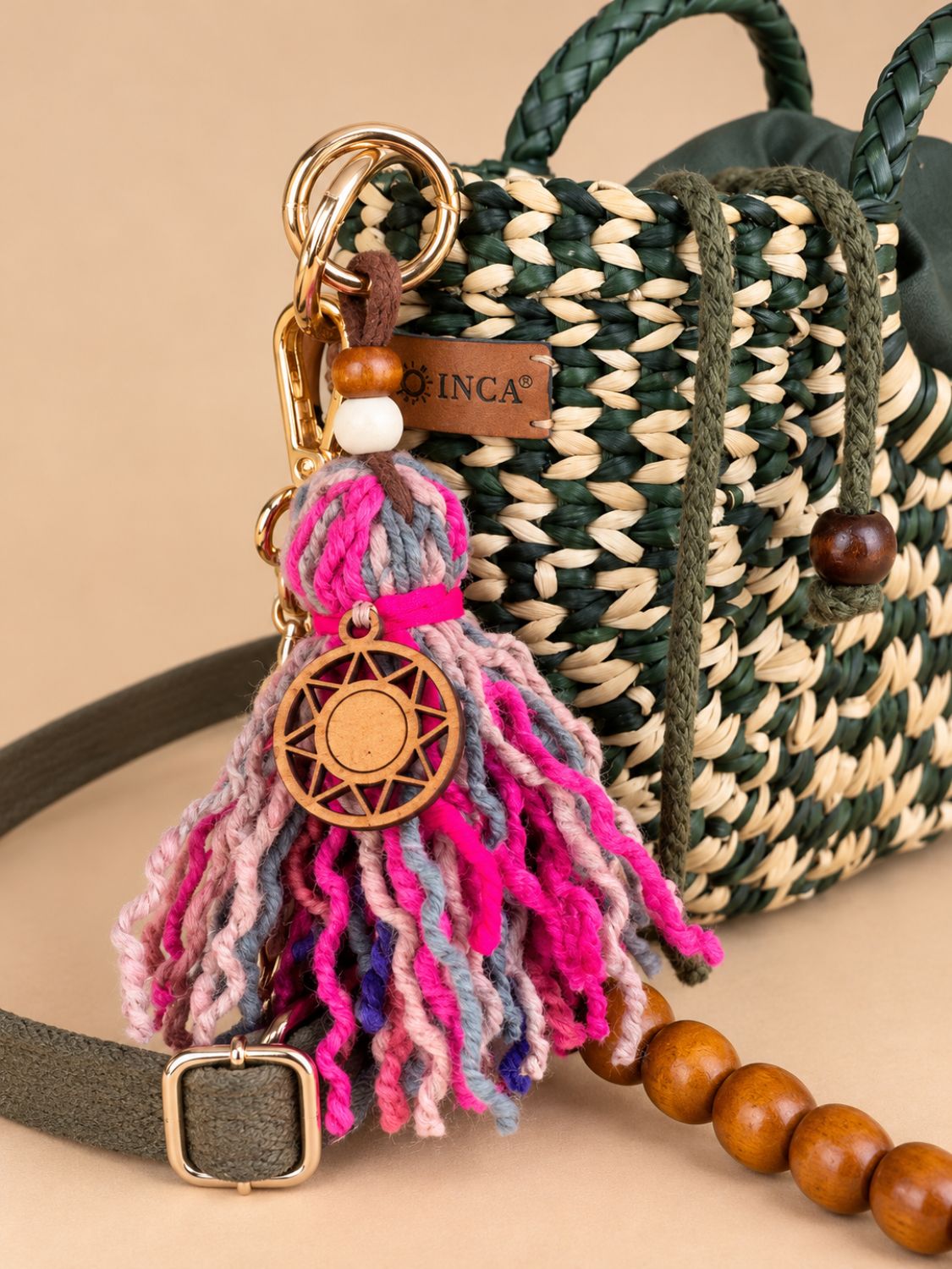 Classic wool charm attached to a bag | Tasselita by Orange Inca