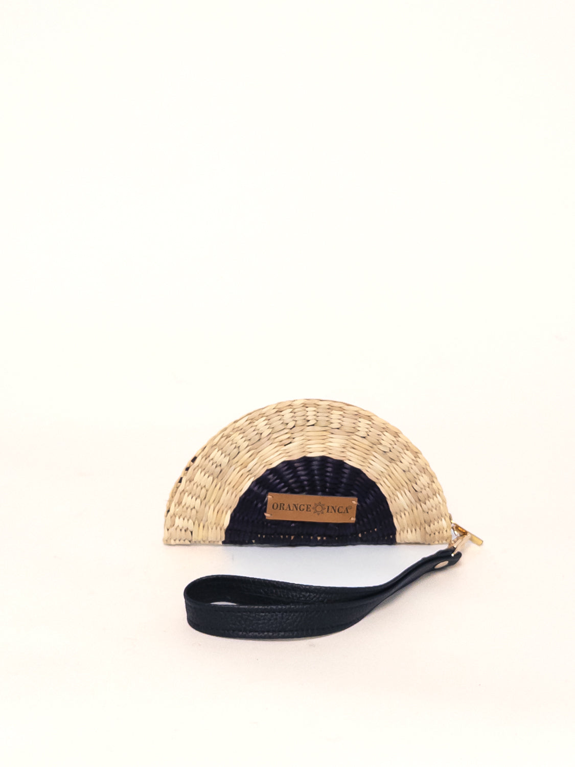 Gran Fiesta Coin Purse – Faux Suede Strap in natural wicker with a navy interior, zip closure, and detachable wrist strap.