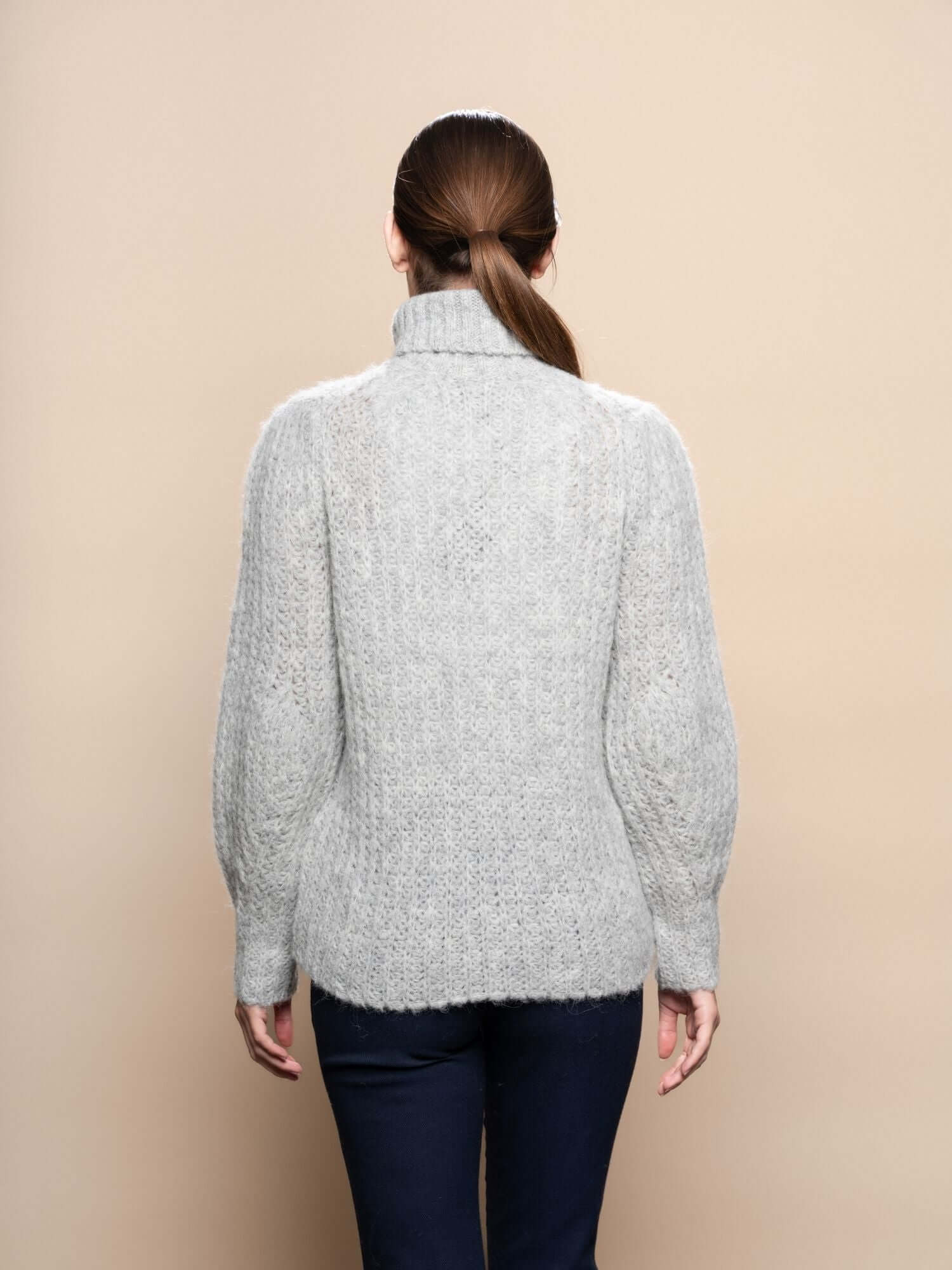 Back view of grey alpaca turtleneck jumper, lightweight breathable knitwear for winter