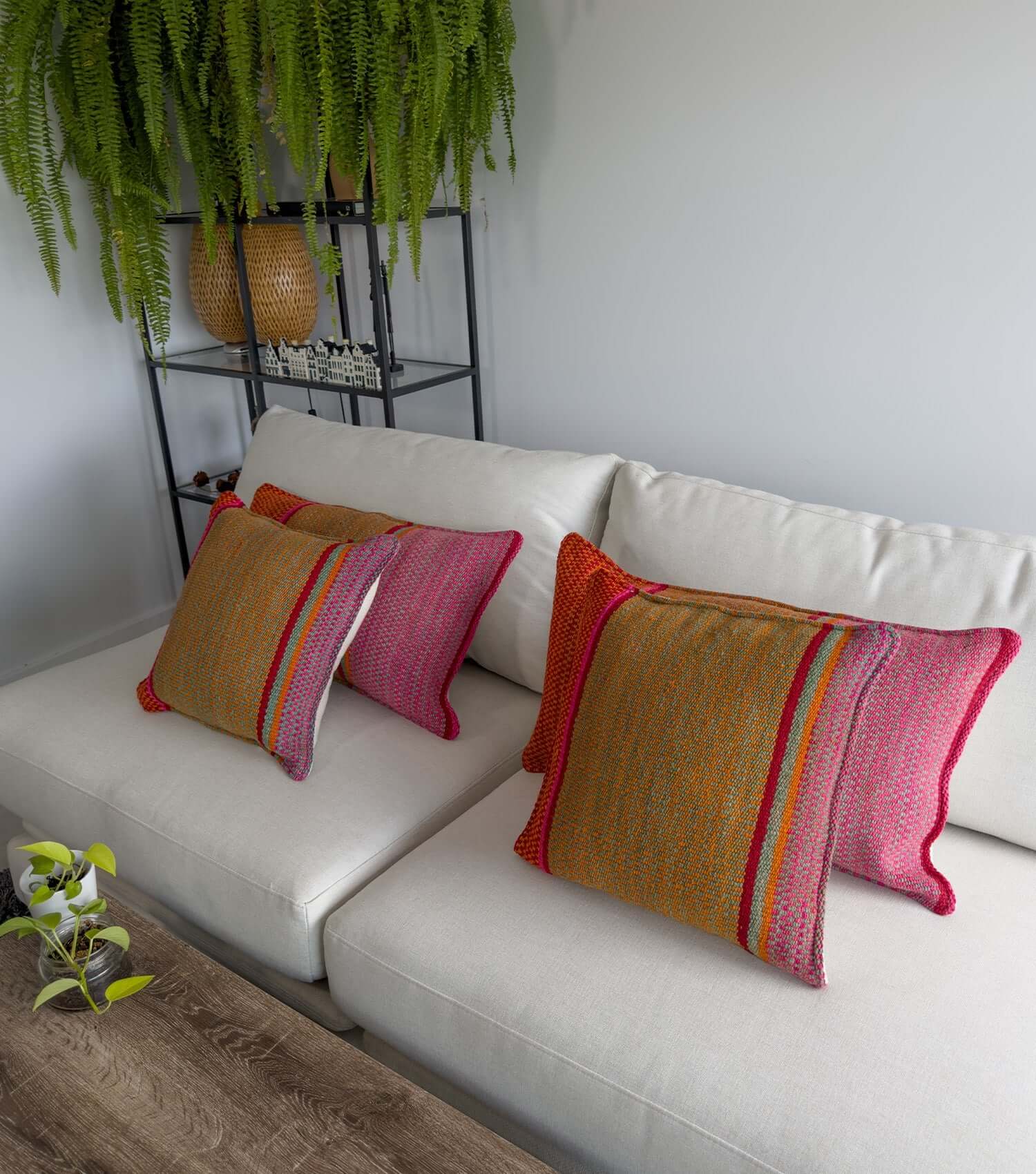 Decorative rectangular pillow 70x40 No.10 styled on sofa showing ethnic pattern and luxury wool texture