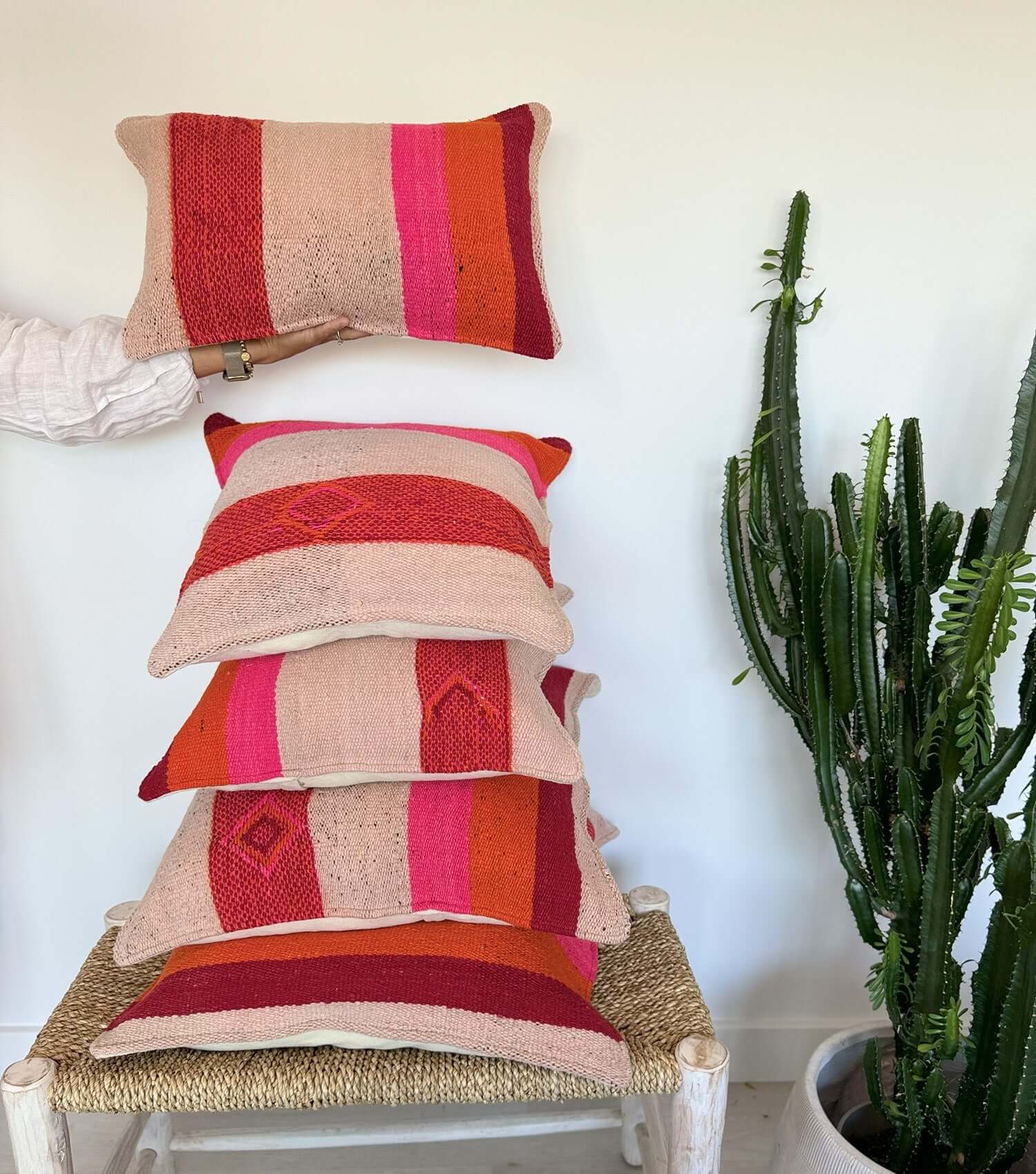 Boho throw pillow 50x30 No.18 styled on accent chair or sofa providing living room decor possibilities