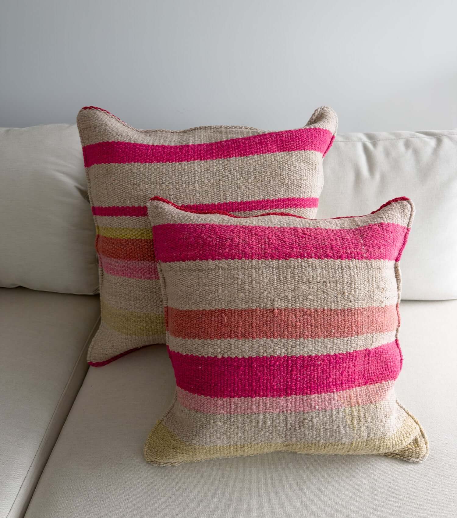 Decorative square pillow 50x50 No.22 styled on sofa showing ethnic pattern and luxury wool texture