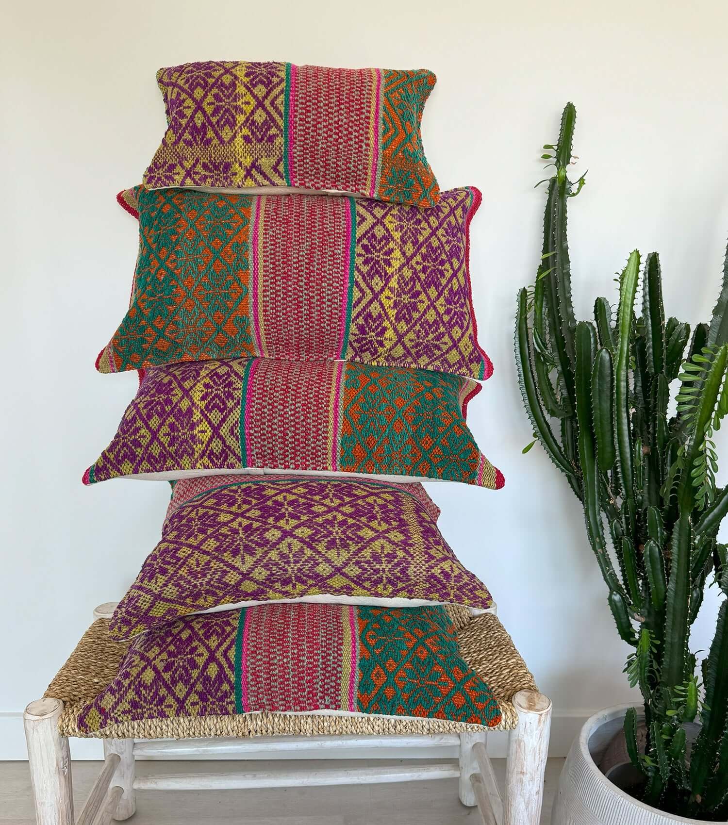 Boho throw pillow 50x30 No.3 styled on accent chair or sofa providing living room decor possibilities