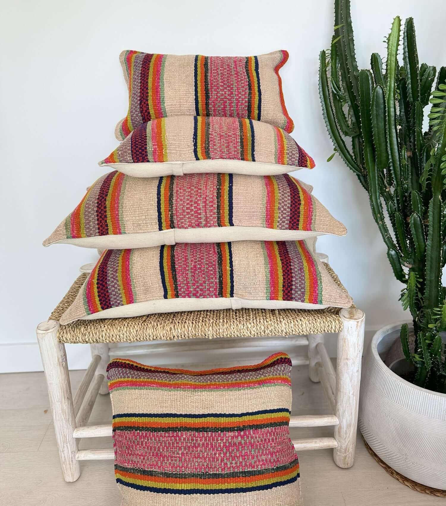 Boho throw pillow 50x30 No.4 styled on accent chair or sofa providing living room decor possibilities