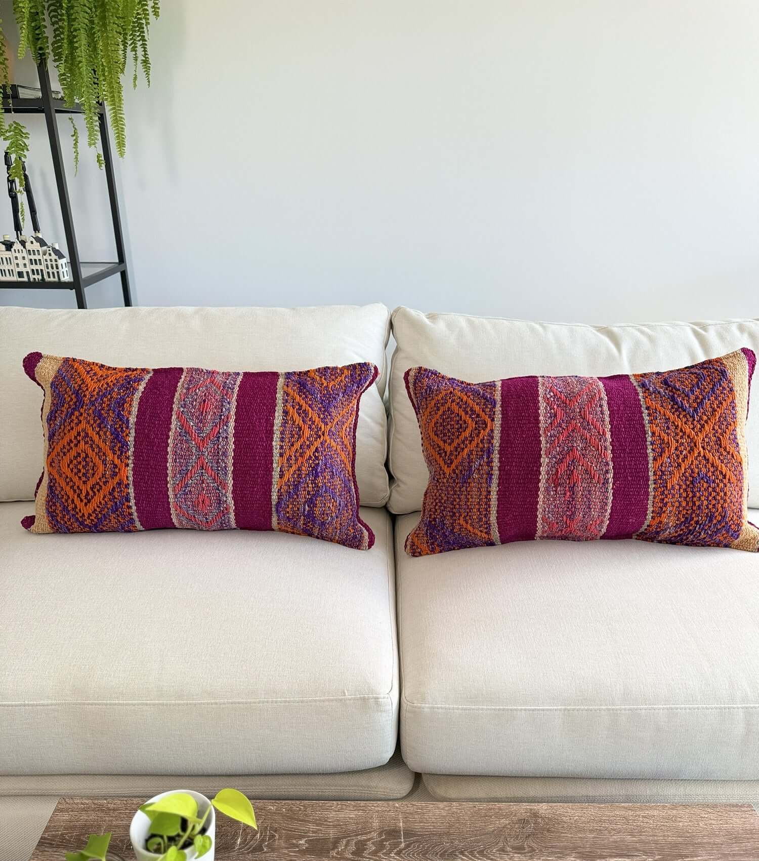 Decorative rectangular pillow 70x40 No.6 styled on sofa showing ethnic pattern and luxury wool texture