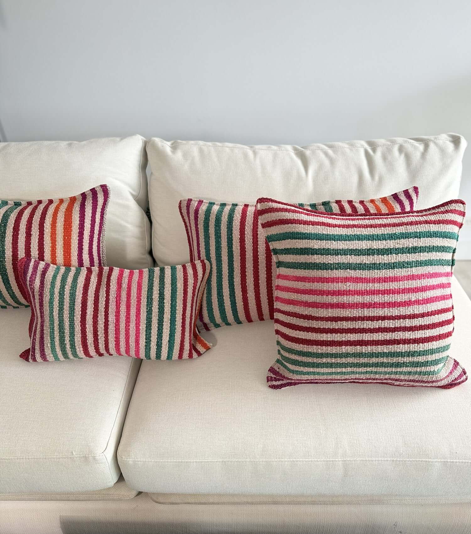 Decorative rectangular pillow 50x30 No.7 styled on sofa showing ethnic pattern and luxury wool texture