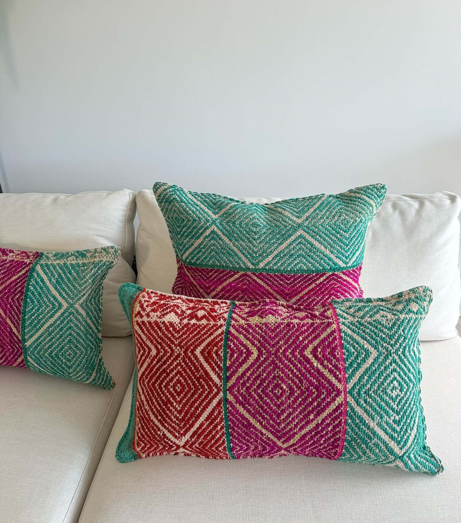 Decorative rectangular pillow 70x40 No.9 styled on sofa showing ethnic pattern and luxury wool texture