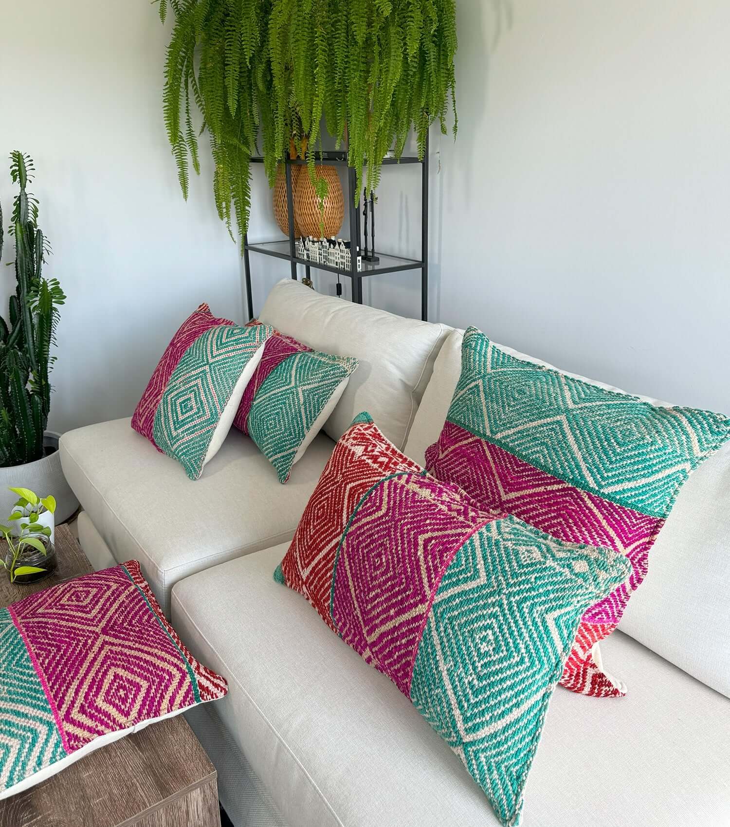 Boho throw pillow, rectangular 70x40 No.9 styled on accent chair or sofa showing living room decor possibilities