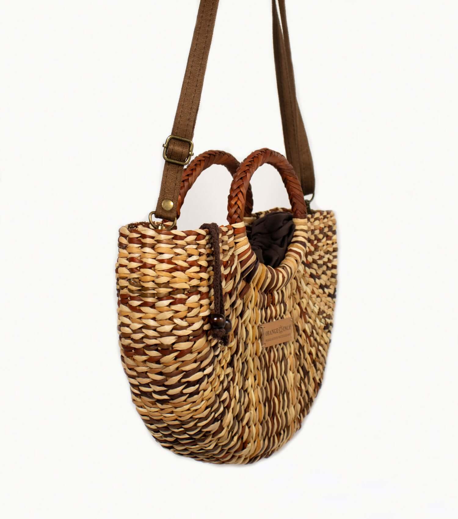 Fiesta Crossbody hanging view - the everyday essential with adjustable leather strap | Brown and Natural, Marbled Style