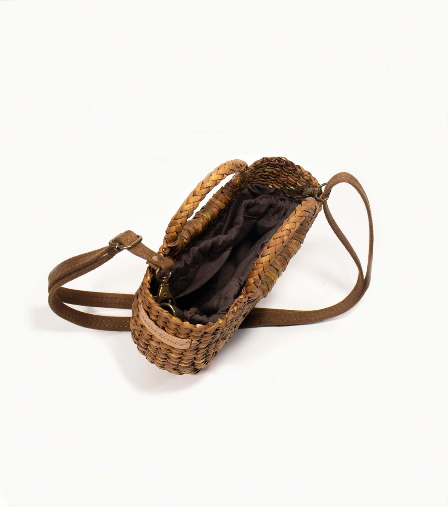 Fiesta Mini brown straw bag flat lay – artisan crossbody handmade in Peru | Orange Inca