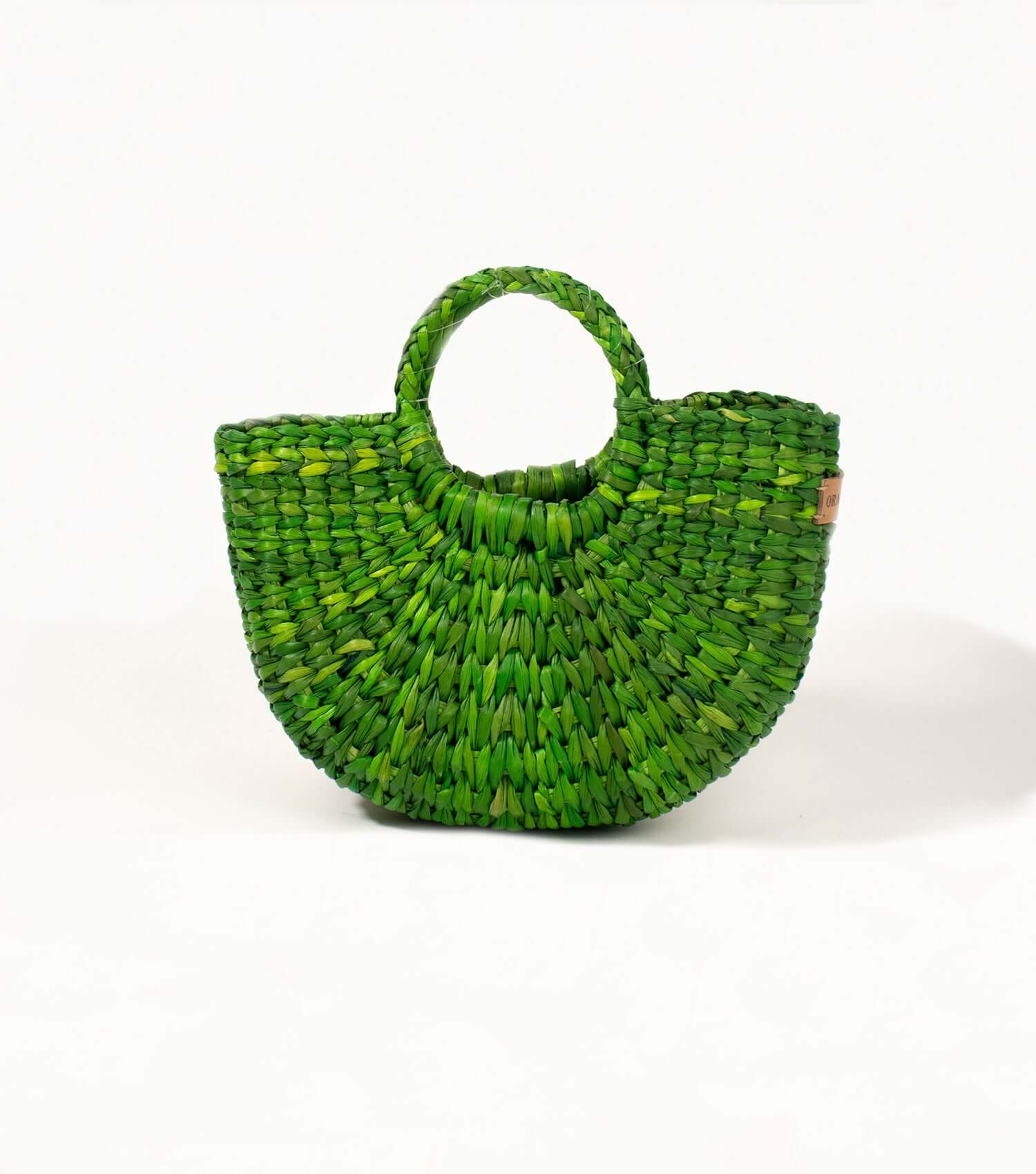Compact emerald green straw crossbody bag front view – artisan bag | Orange Inca