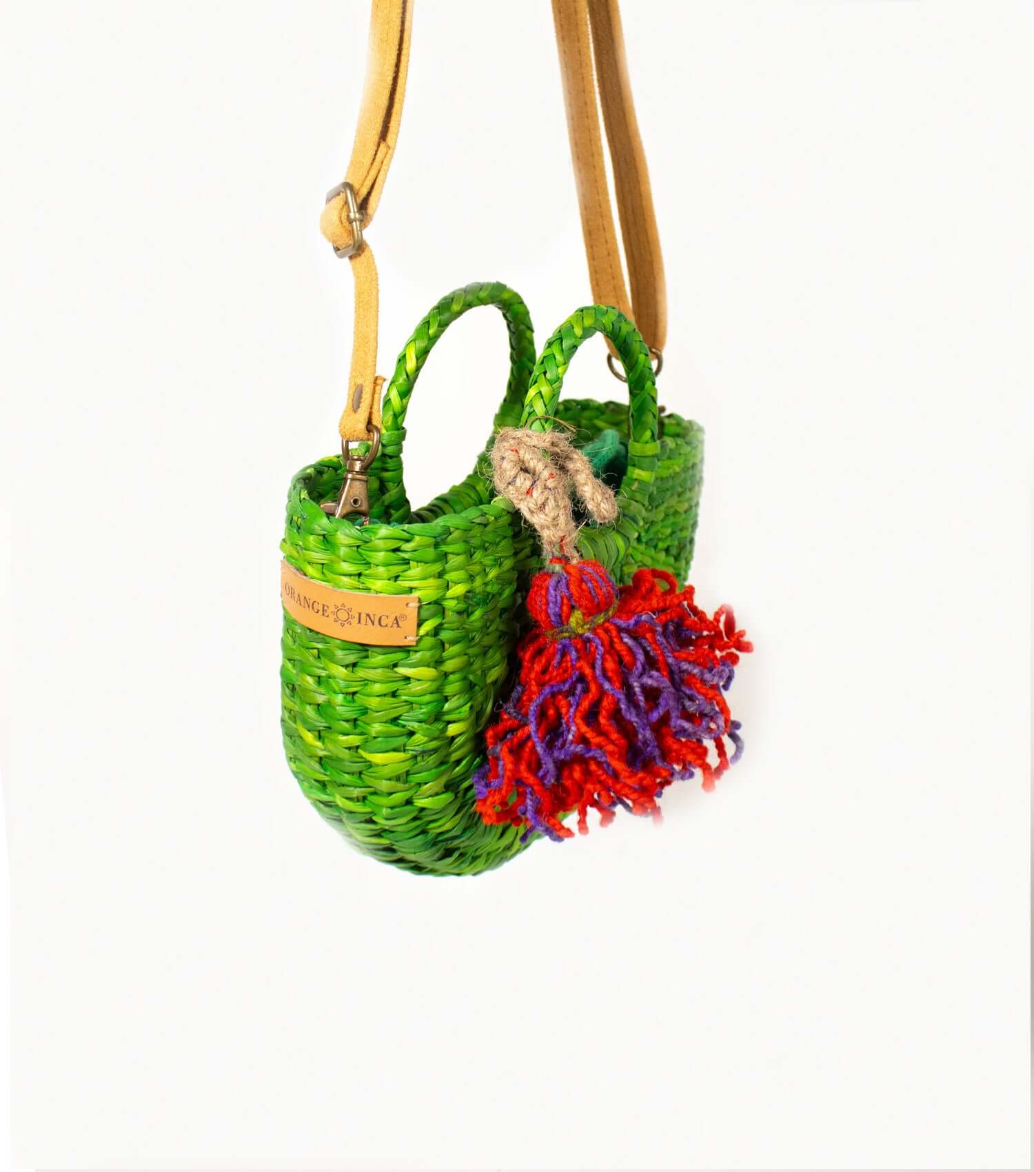 Emerald green woven straw crossbody bag with adjustable strap – Fiesta Mini | Orange Inca
