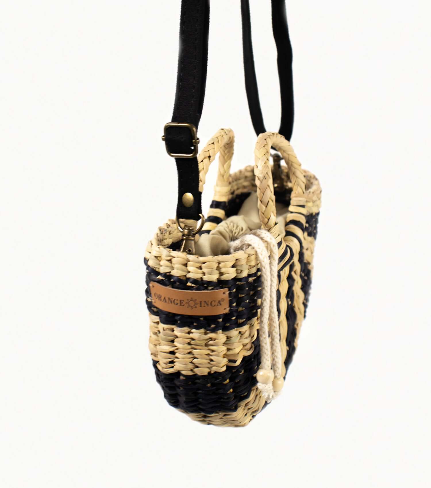 Fiesta Mini natural black striped straw bag worn crossbody – everyday bag | Orange Inca