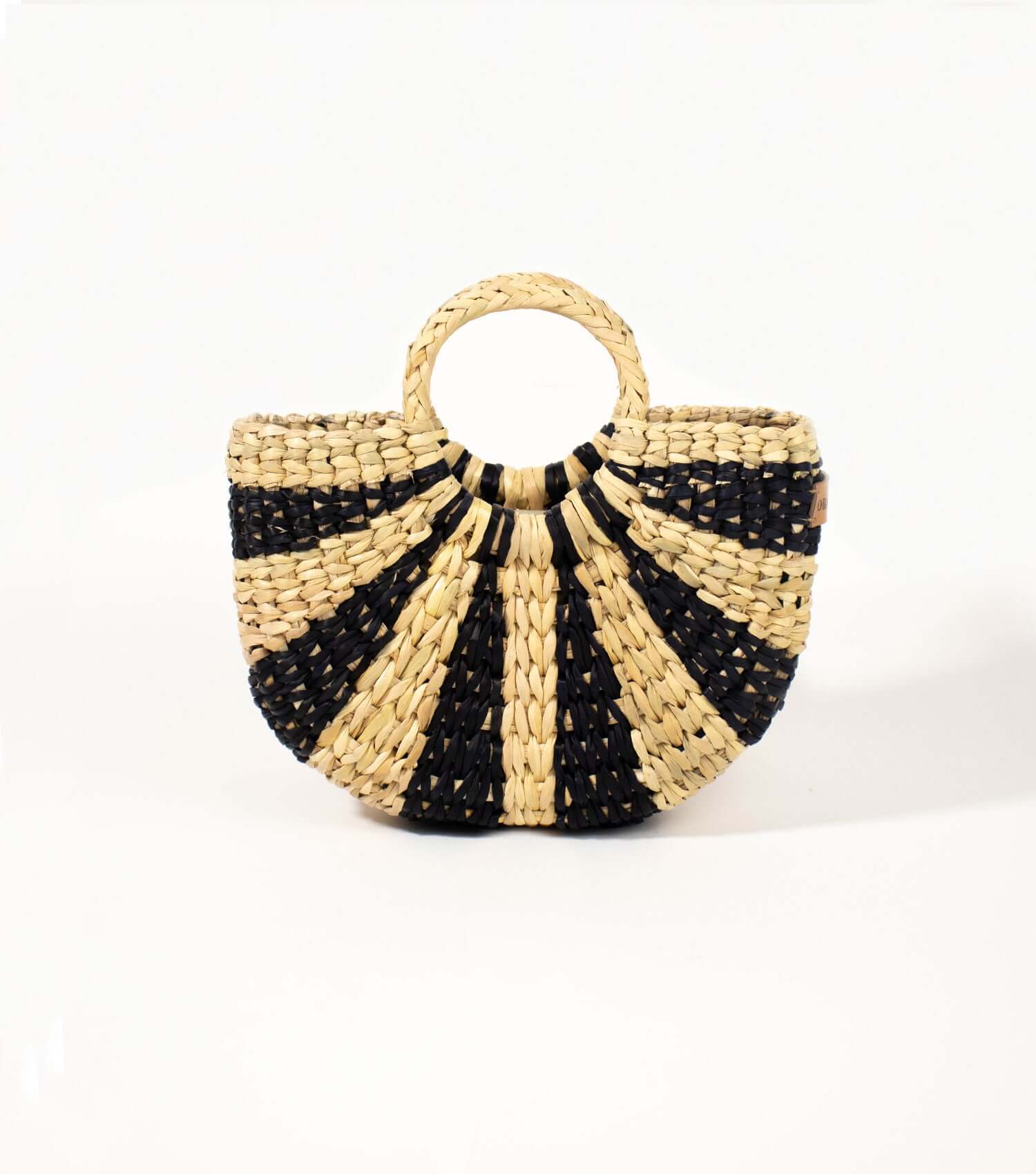 Black and natural striped straw crossbody flat lay – Fiesta Mini Original | Orange Inca