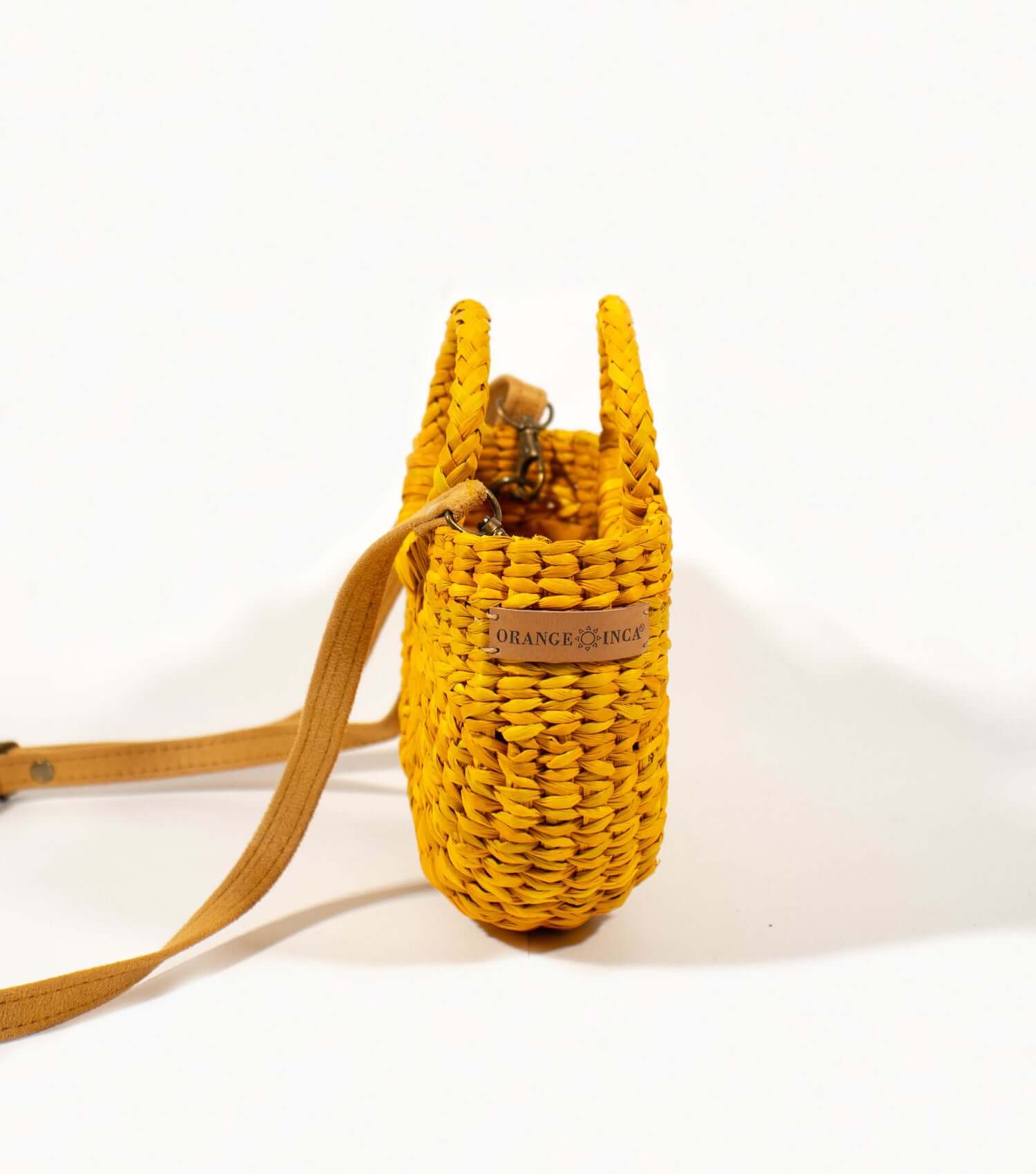 Bright yellow straw mini bag front view – artisan crossbody handmade in Peru | Orange Inca