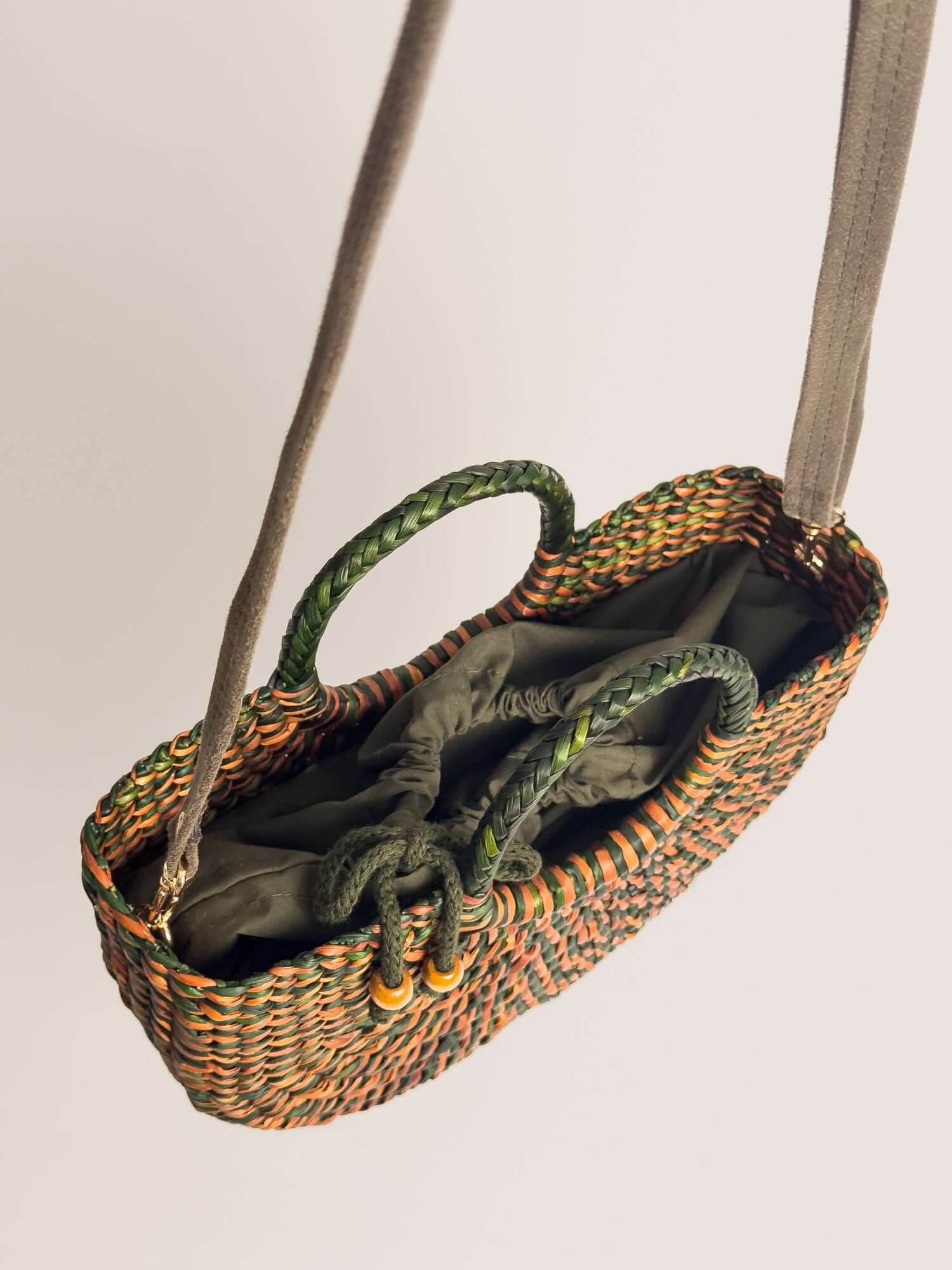 Inside Fiesta reed crossbody bag with drawstring closure |Marbled Olive Green Camel