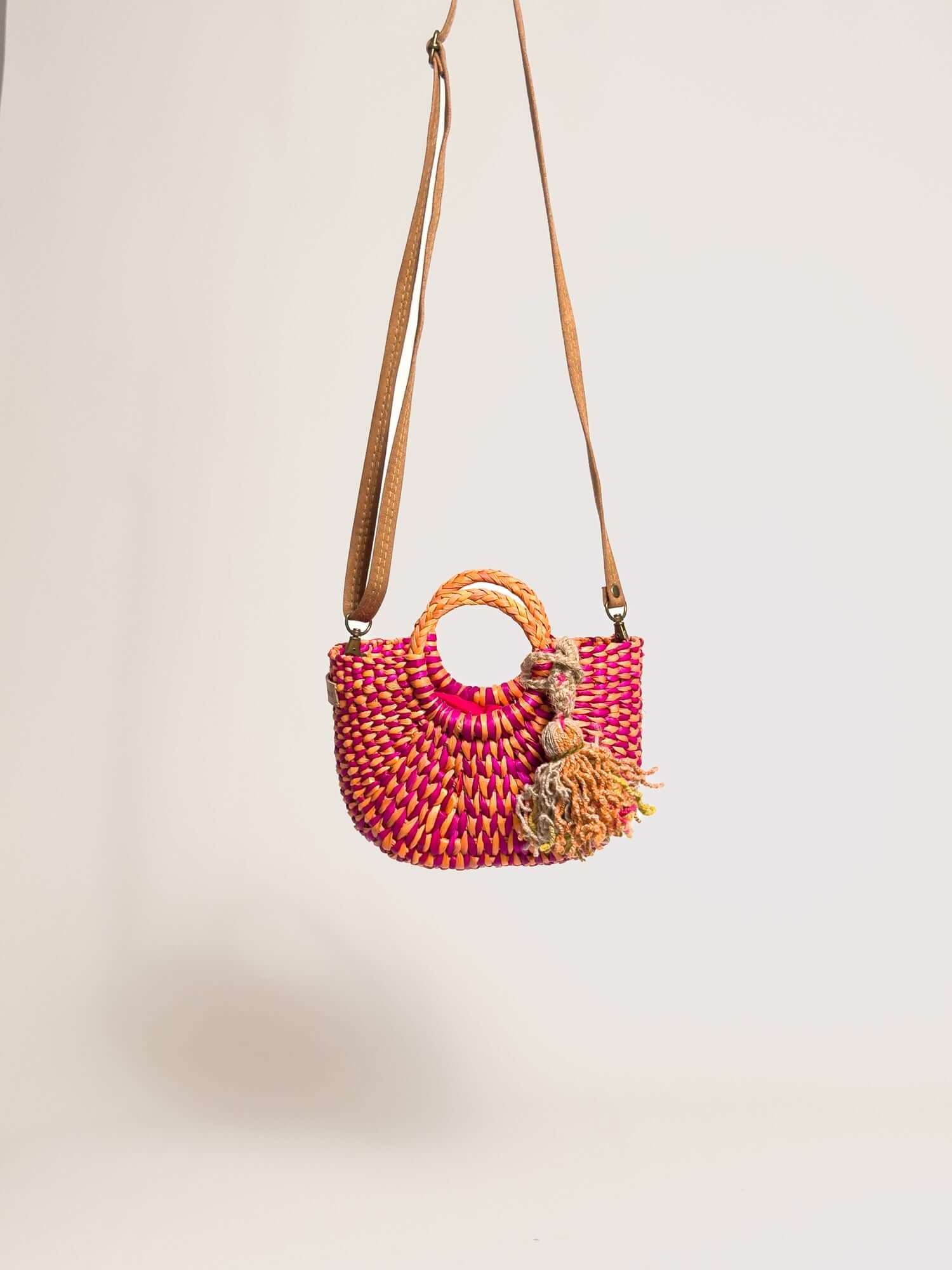 Orange Inca everyday mini bag with artisanal tassel and strap | Marbled Fuchsia Yellow