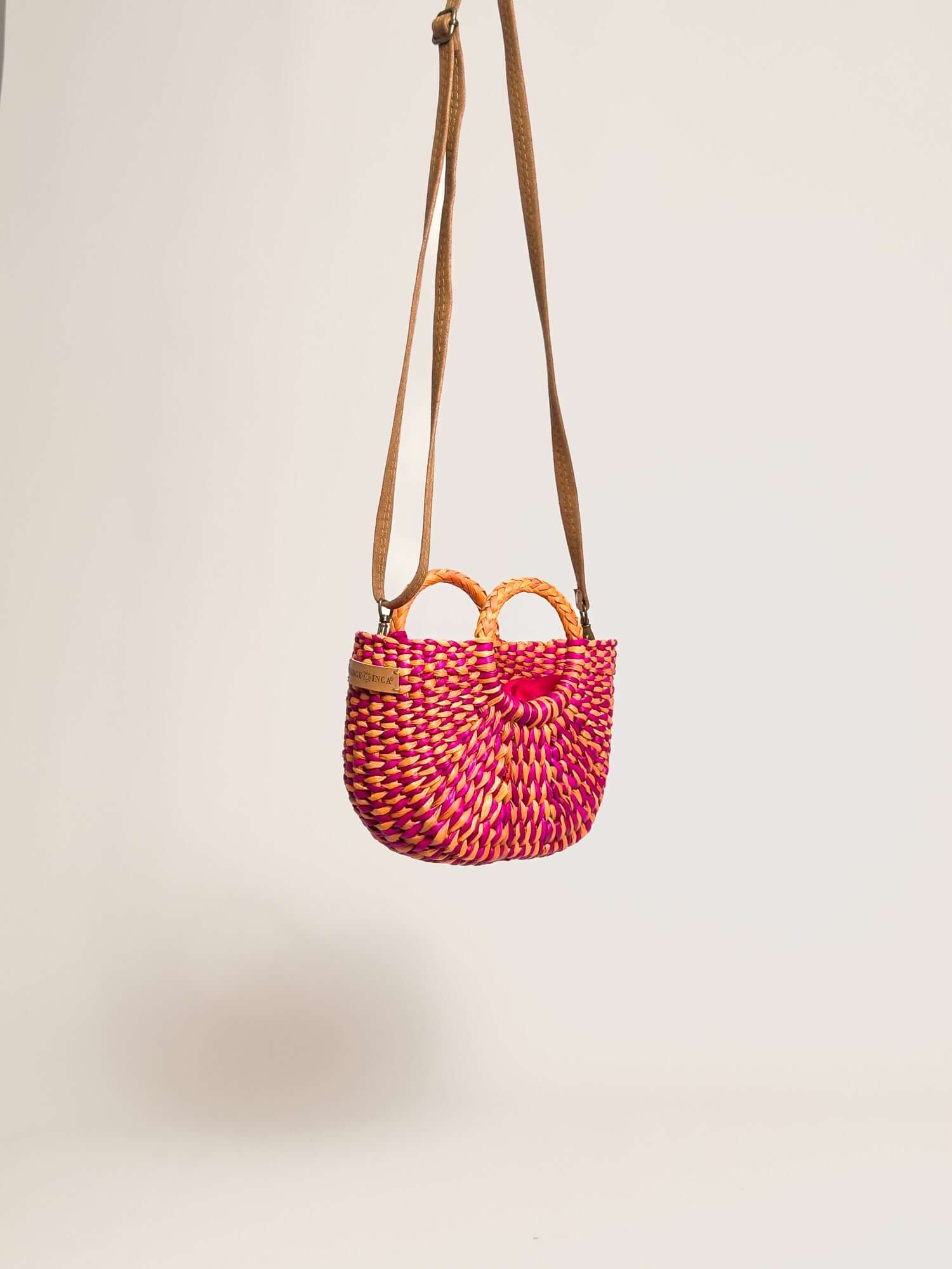 Handwoven straw crossbody bag w removable straps | Marbled Fuchsia Yellow