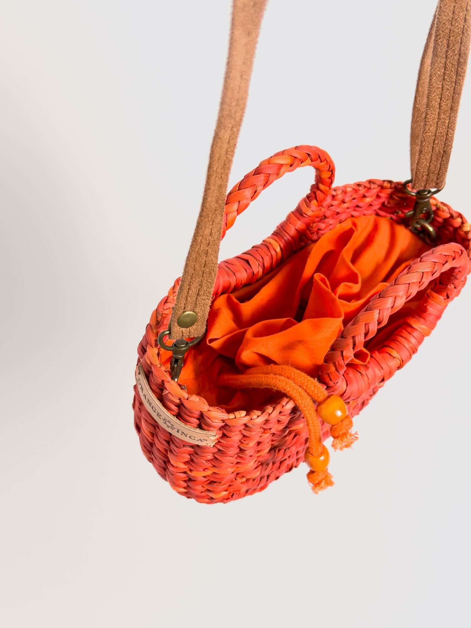 Interior of Fiesta Mini Classic straw bag with drawstring closure – orange | Orange Inca