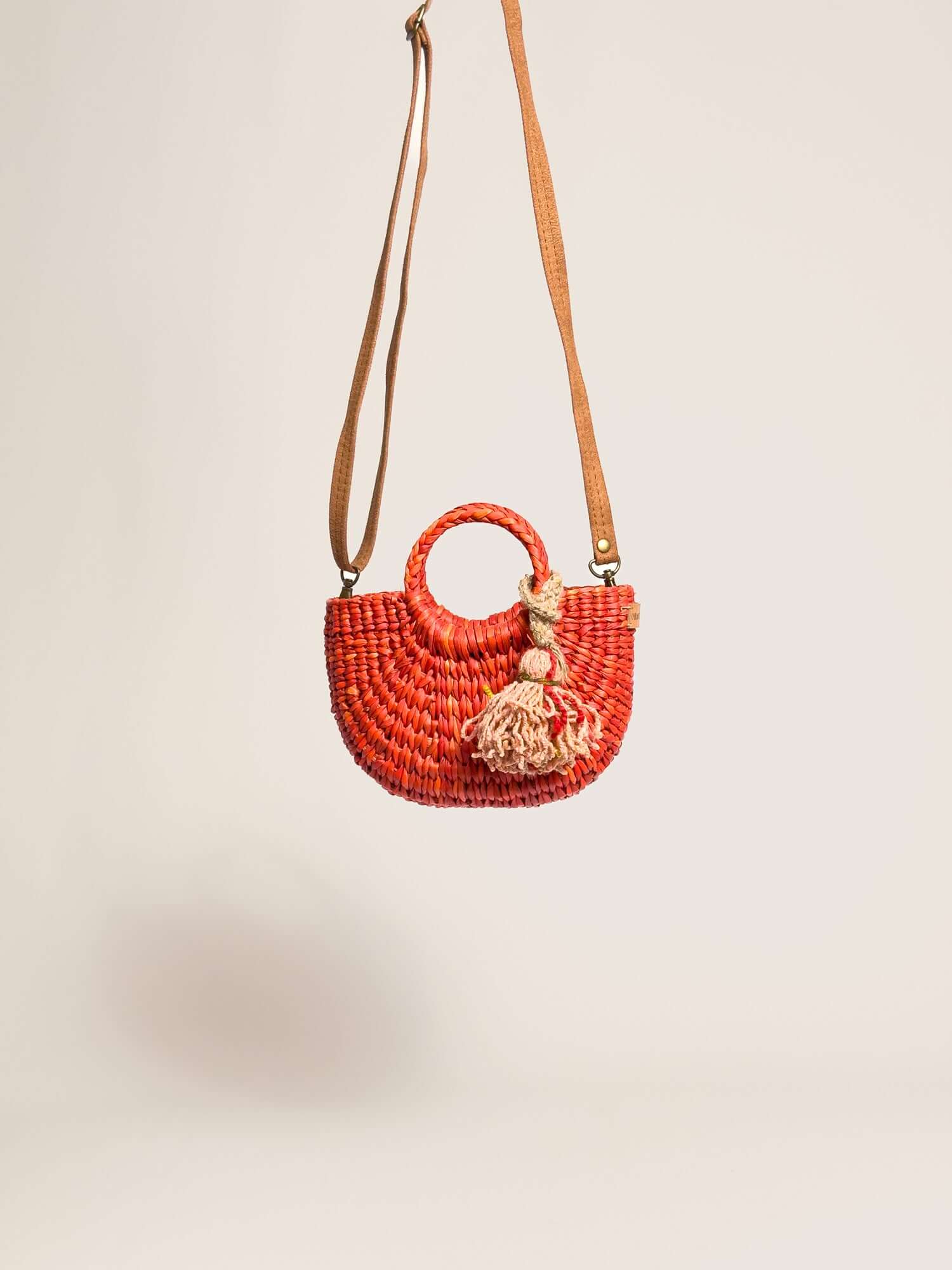 Fiesta Mini Classic orange straw bag with tassel detail – handmade in Peru | Orange Inca