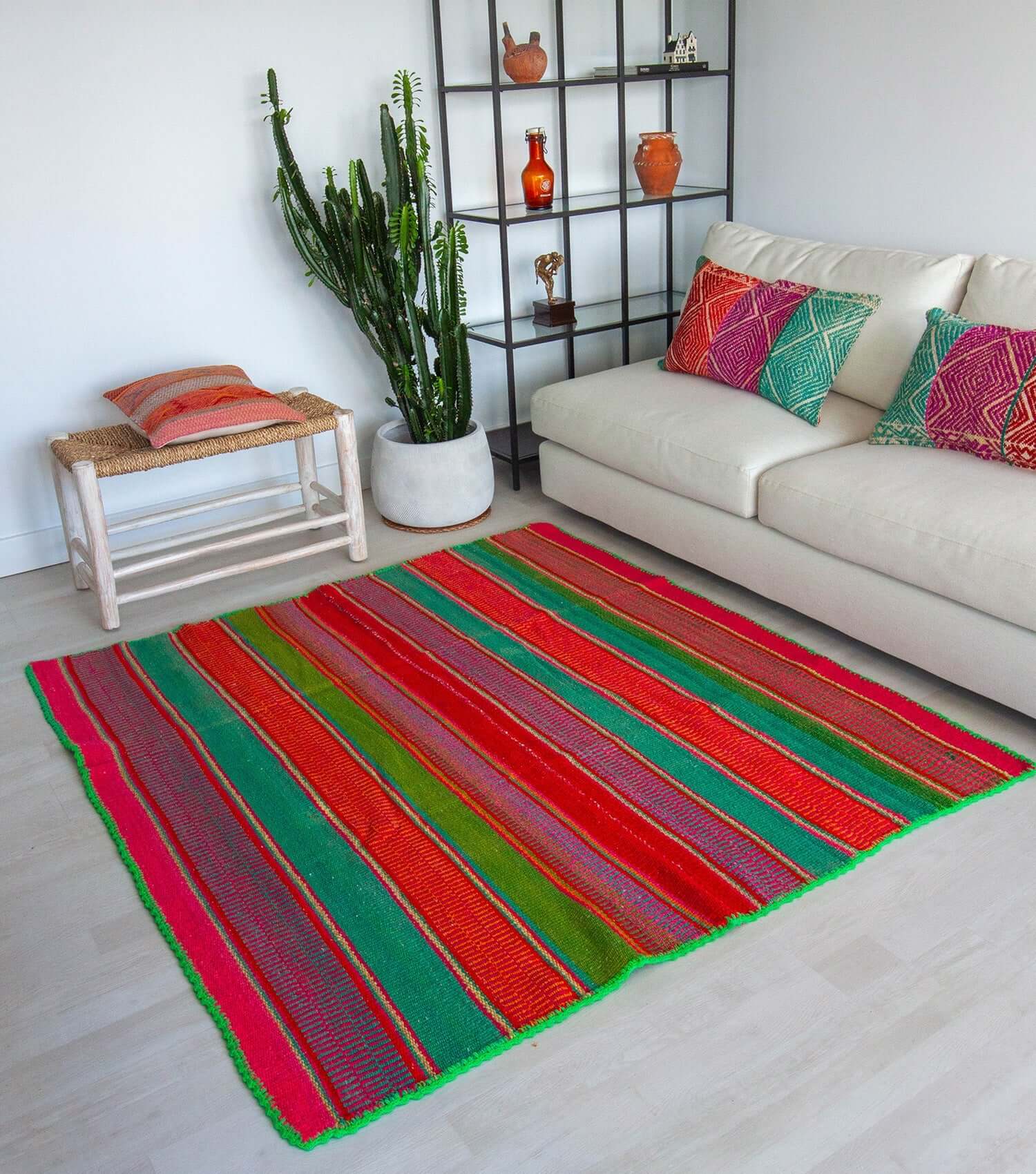 Peruvian frazada No. 12 styled as floor rug — traditional Andean weaving, 179×166cm | Orange Inca