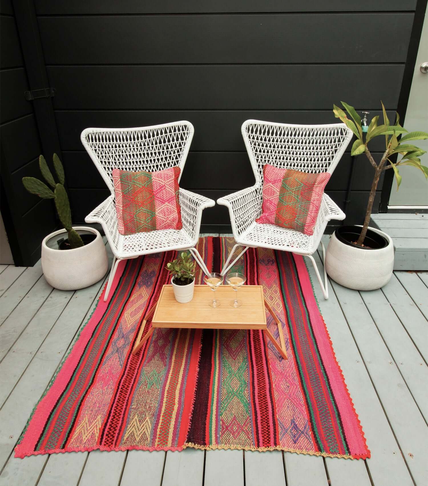Peruvian frazada No. 18 styled as floor rug — traditional Andean weaving, 172×132cm | Orange Inca