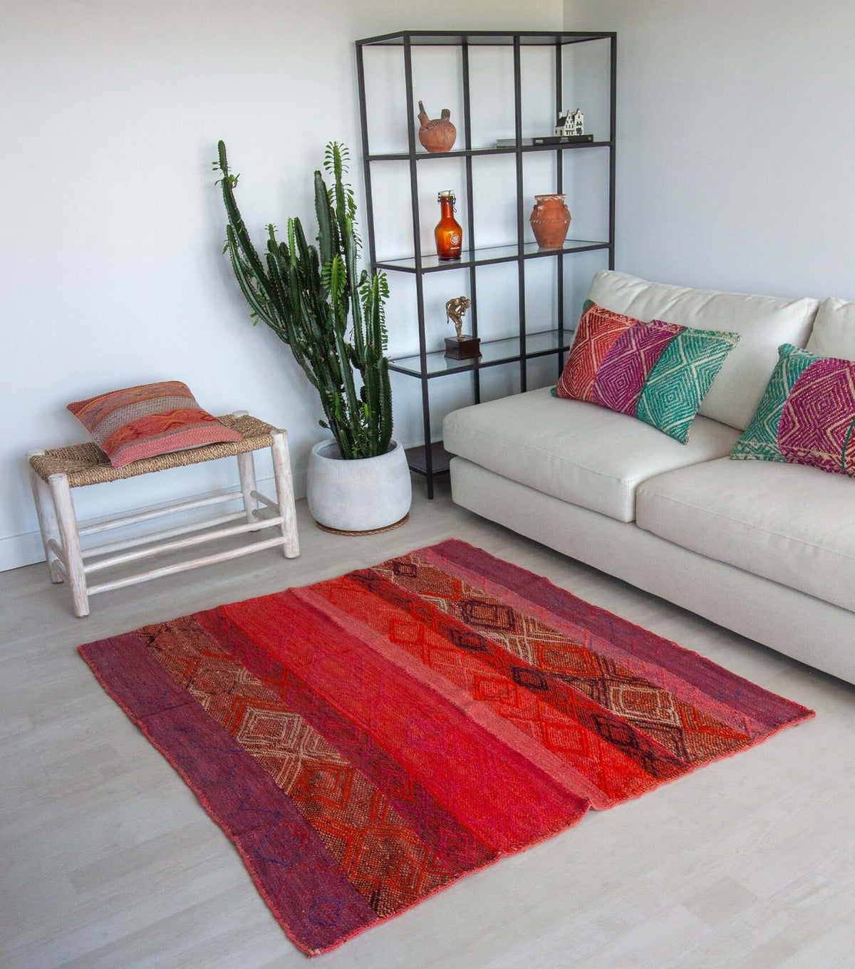 Peruvian frazada No. 4 styled as floor rug — traditional Andean weaving, 150×139cm | Orange Inca