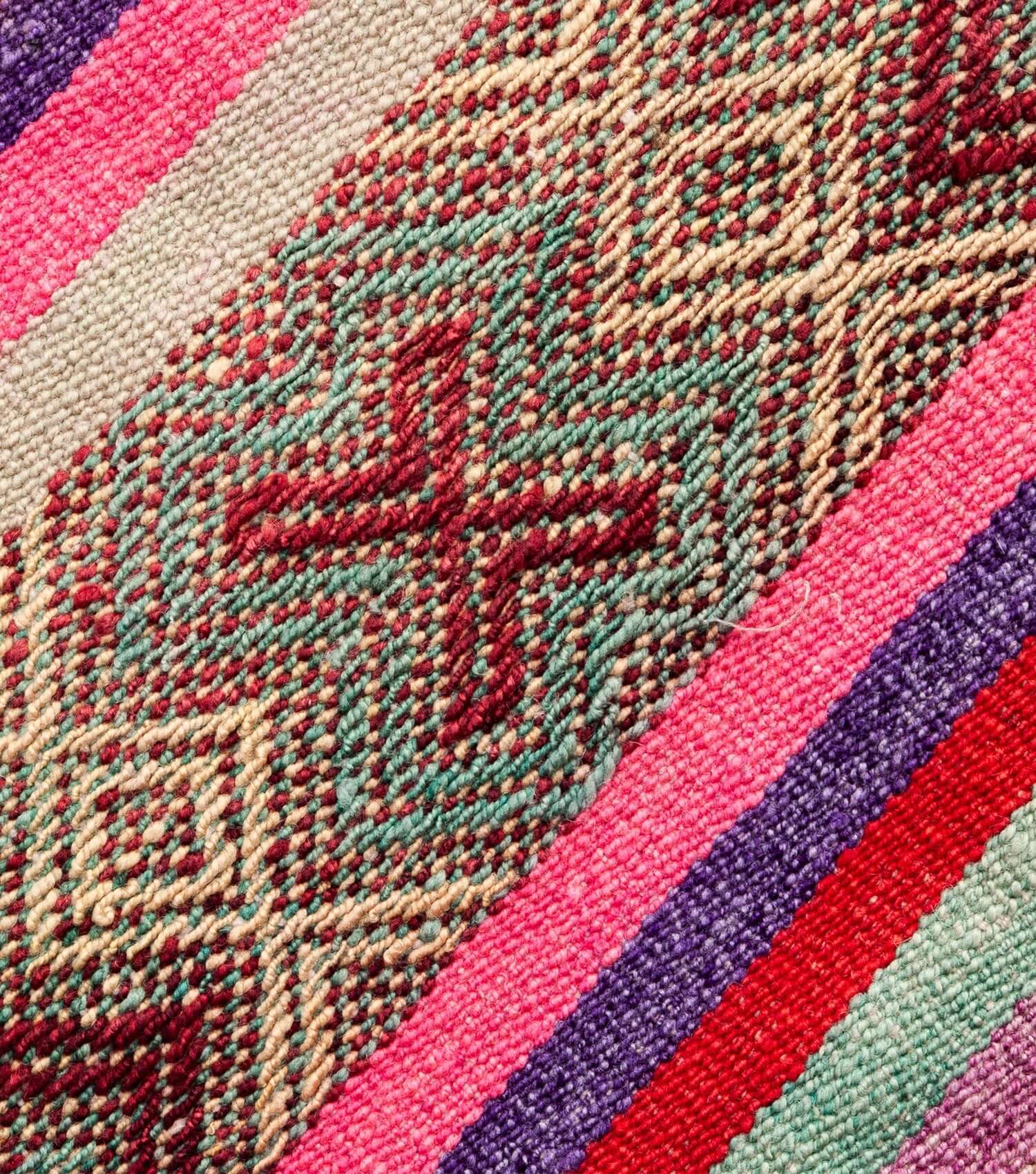 Close-up detail of Peruvian frazada No. 8 — handwoven blue, pink, red, purple and lilac, naturally dyed sheep wool | Orange Inca