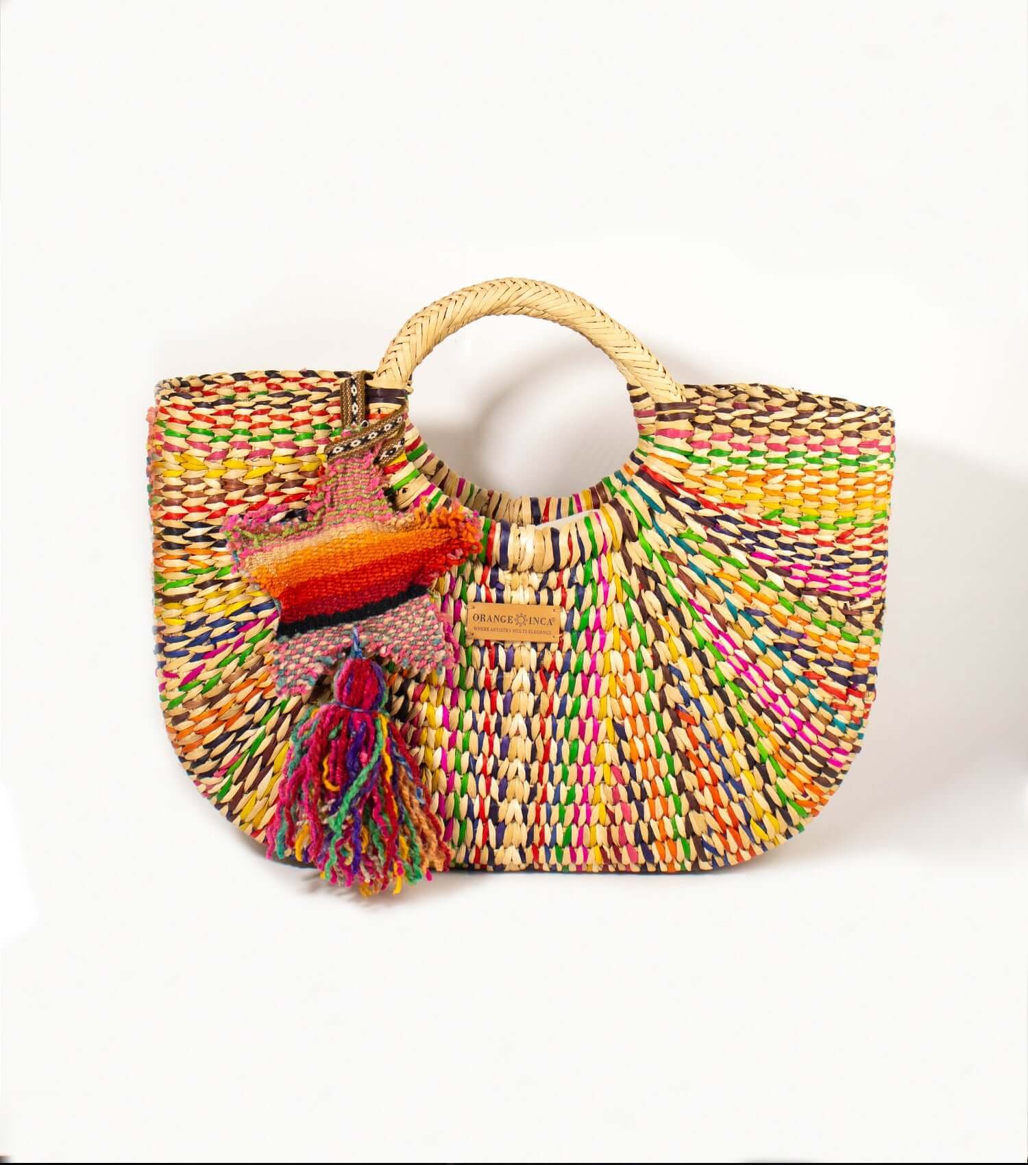 Large decorative star wool tassel showing handcrafted design and vibrant Peruvian textile pattern