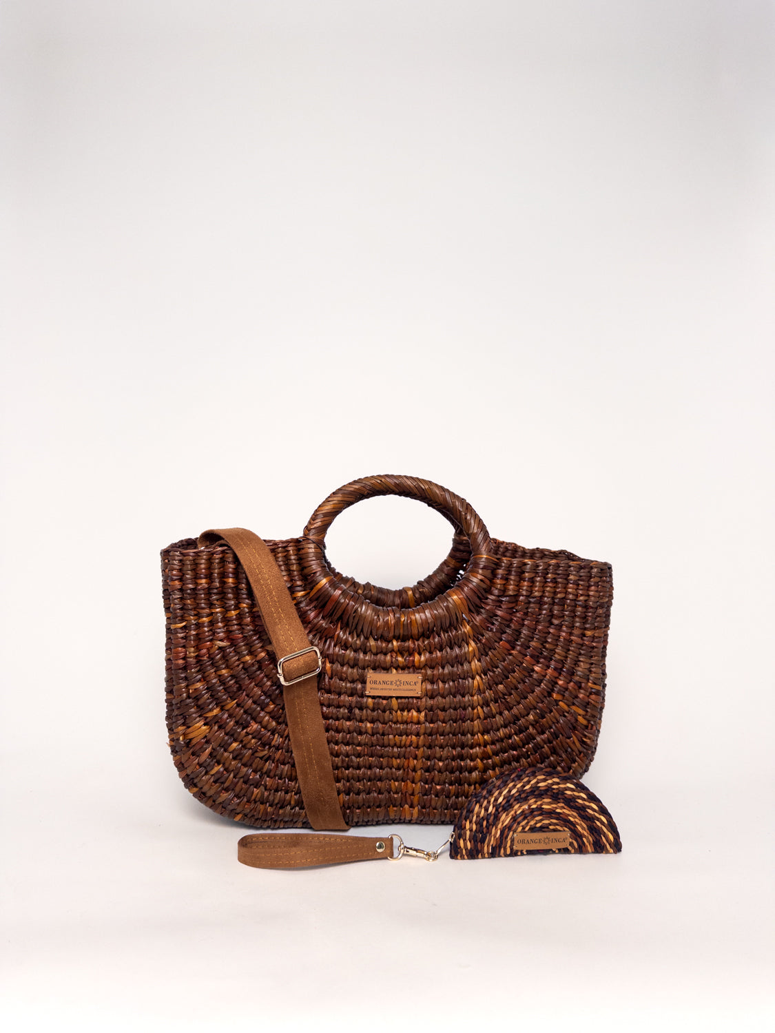 Gran Fiesta Crossbody Tote - Brown handwoven junco tote bag with structured handbag design and adjustable strap.
