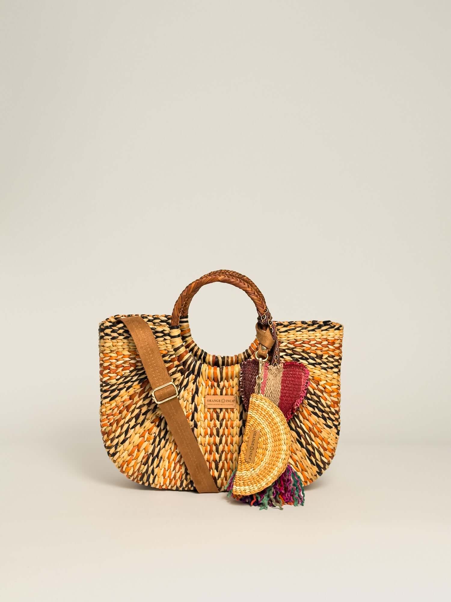 Gran Fiesta Crossbody Tote - Marbled Browns and Natural handwoven junco tote bag with structured handles and adjustable strap.