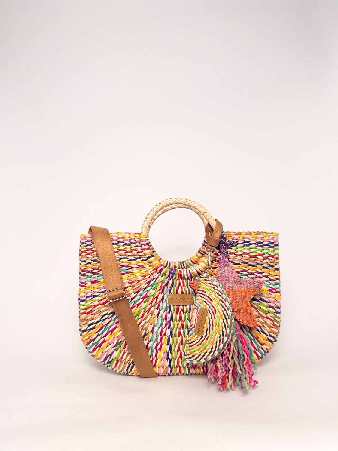 Gran Fiesta Crossbody Tote - Natural Carnival, handwoven junco tote bag, structured handbag, colorful design, round handles, adjustable strap.