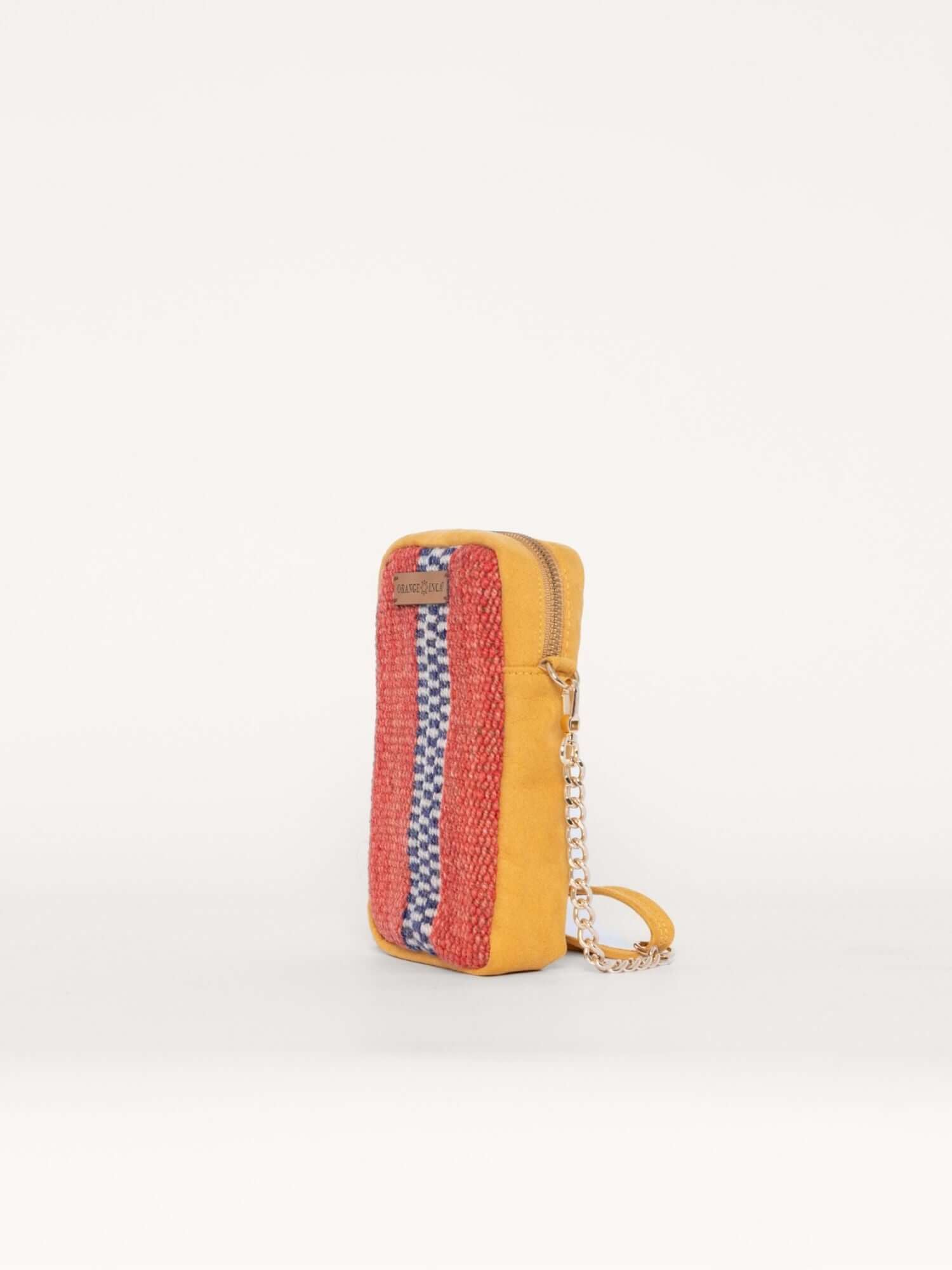 Diagonal view of mini phone crossbody in bright yellow suede – artisan woven wool with soft structure