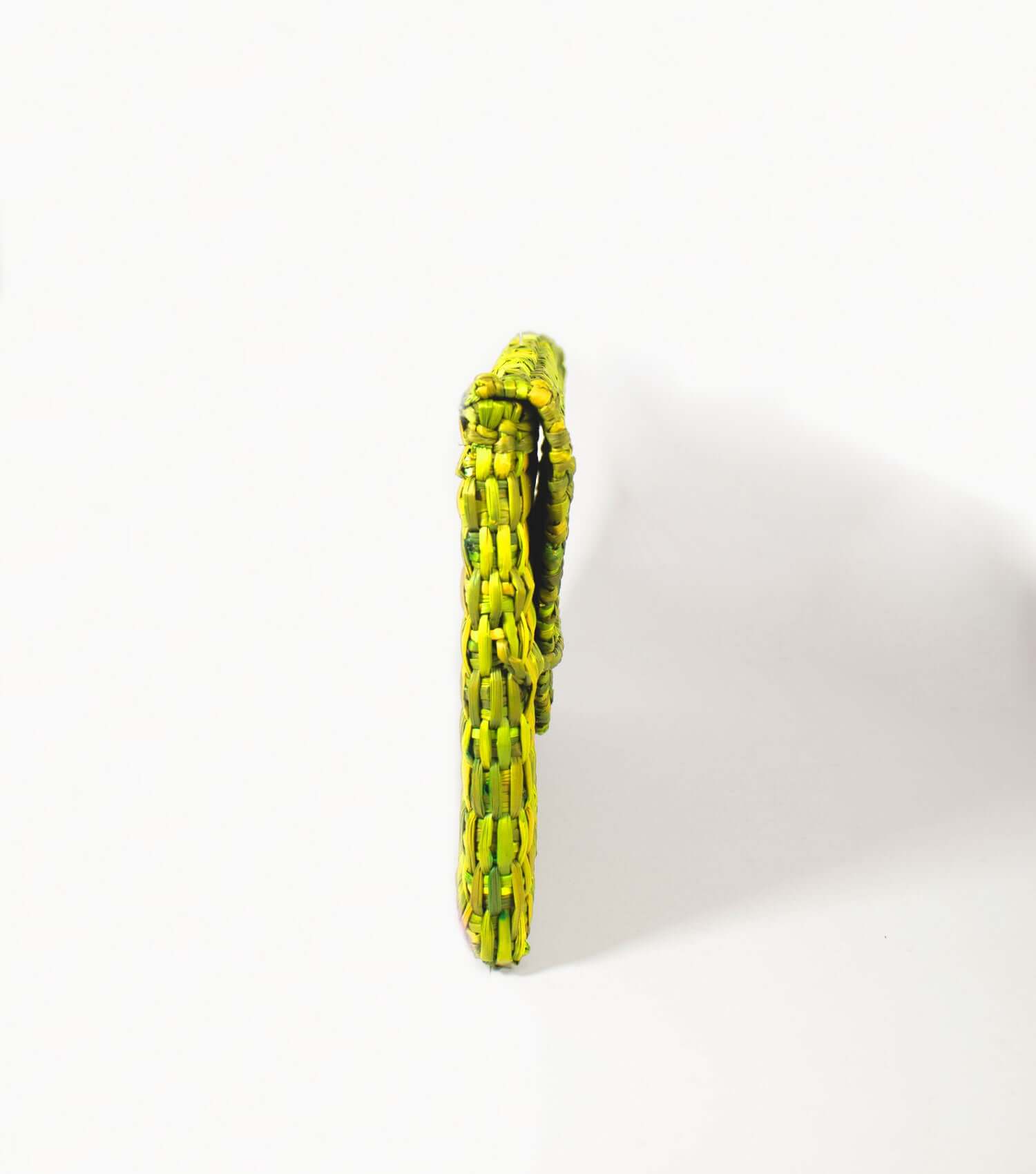 Lima Clutch green lime side angle – slim envelope silhouette, naturally dyed | Orange Inca