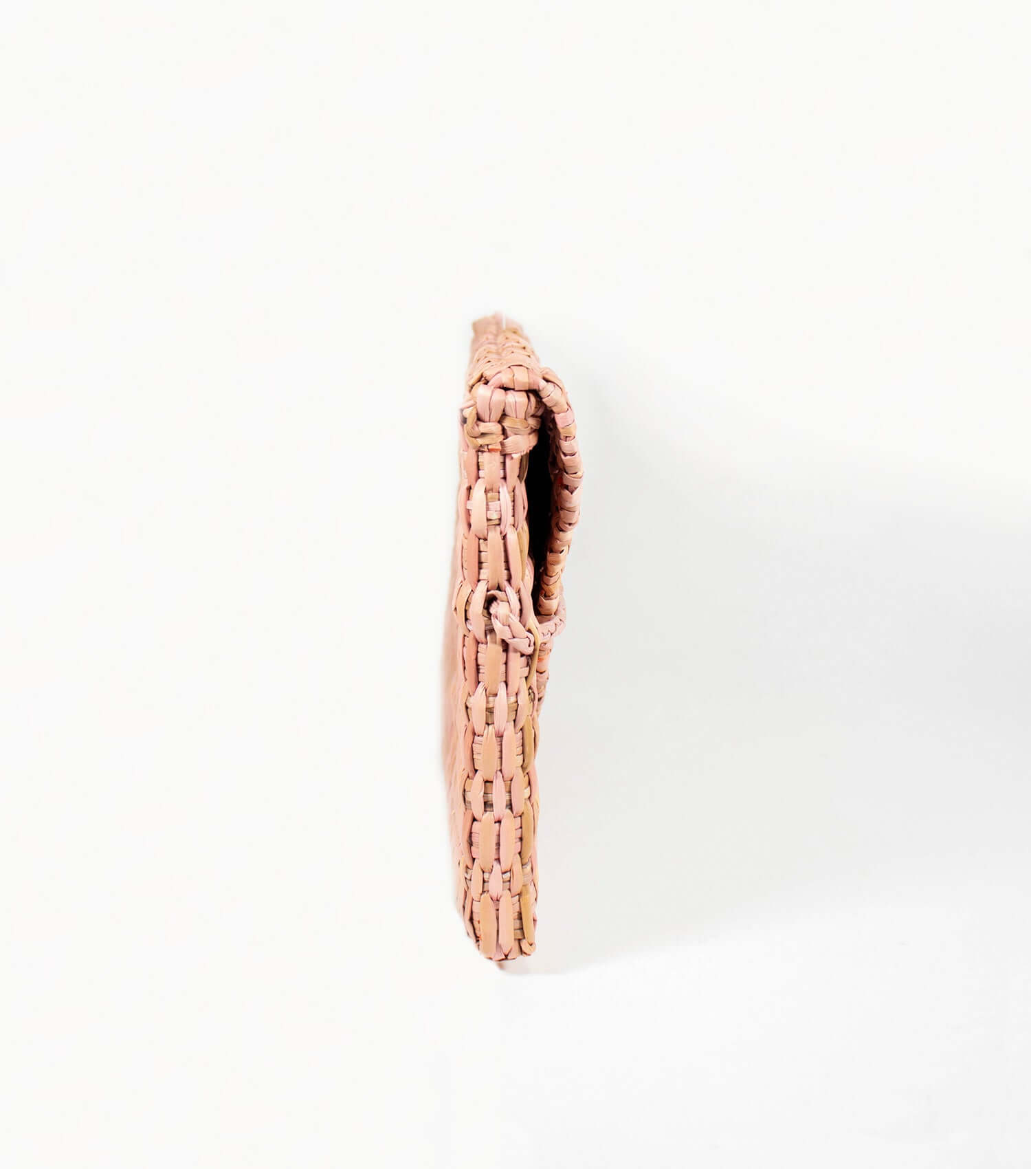 Lima Clutch pale rose side angle – slim envelope silhouette, naturally dyed | Orange Inca