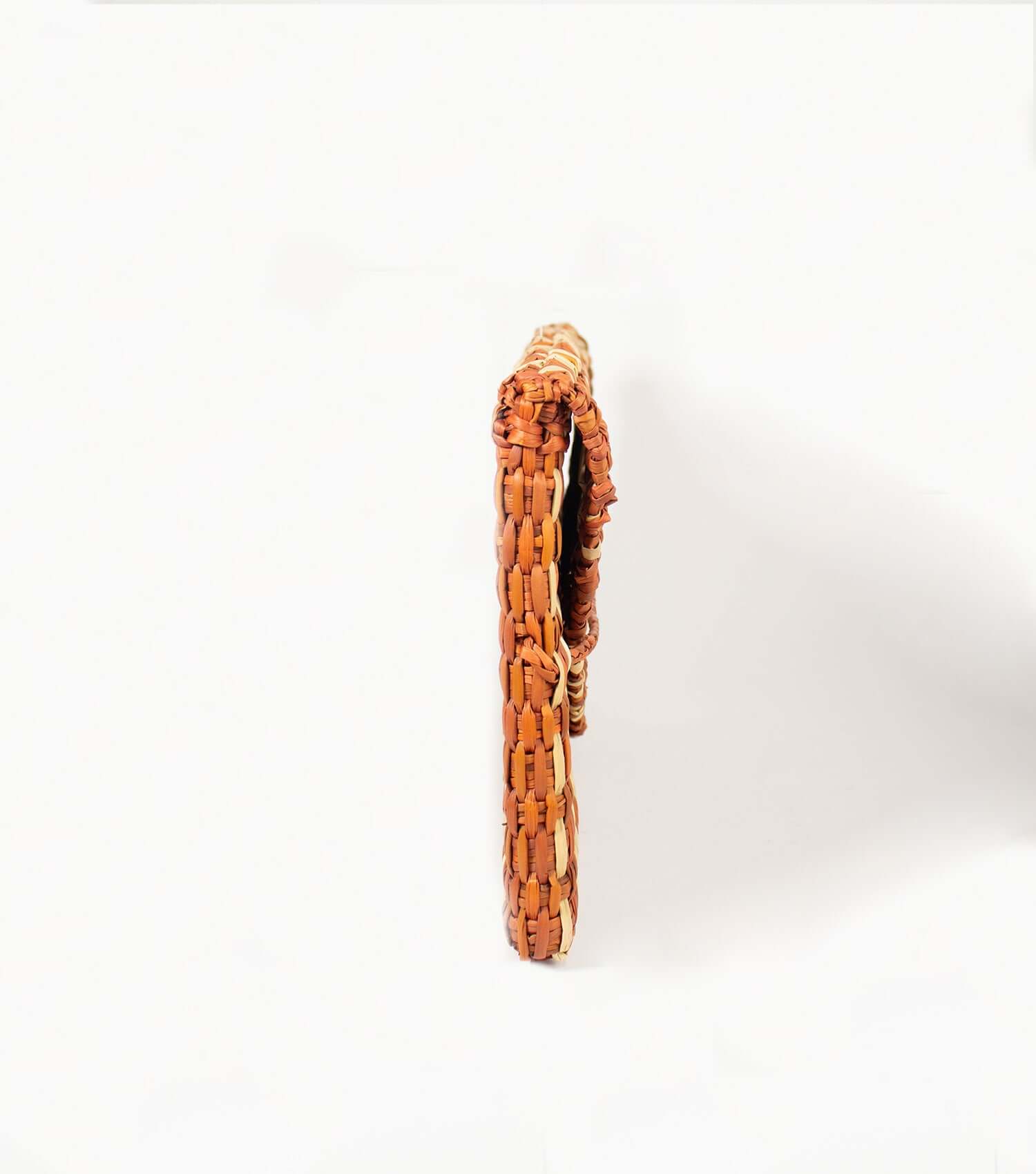 Lima Clutch side angle - resort party bag | Orange Terracota and Natural