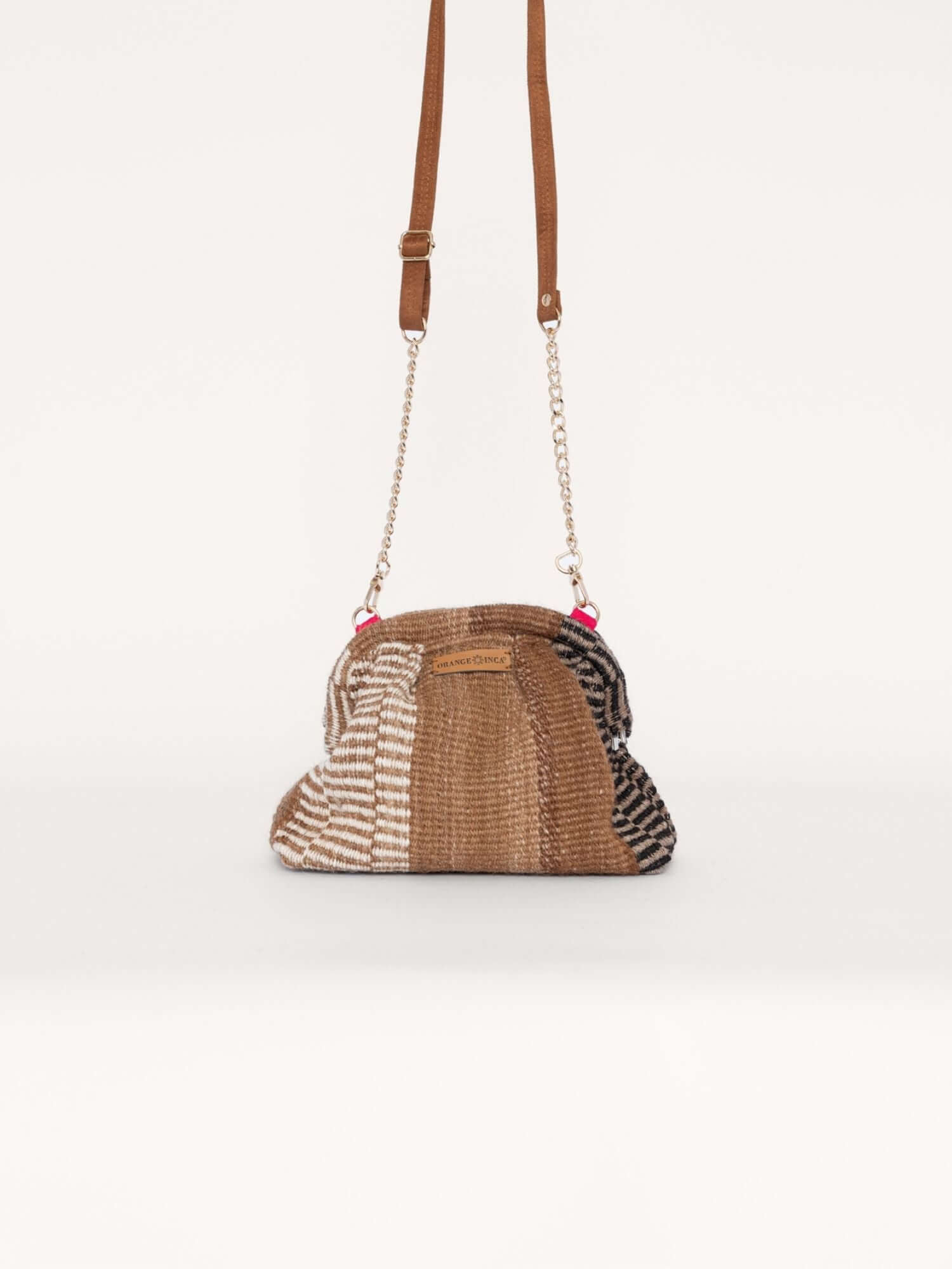 Alpaca wool kiss lock clutch hanging by gold chain strap – versatile handmade crossbody evening bag