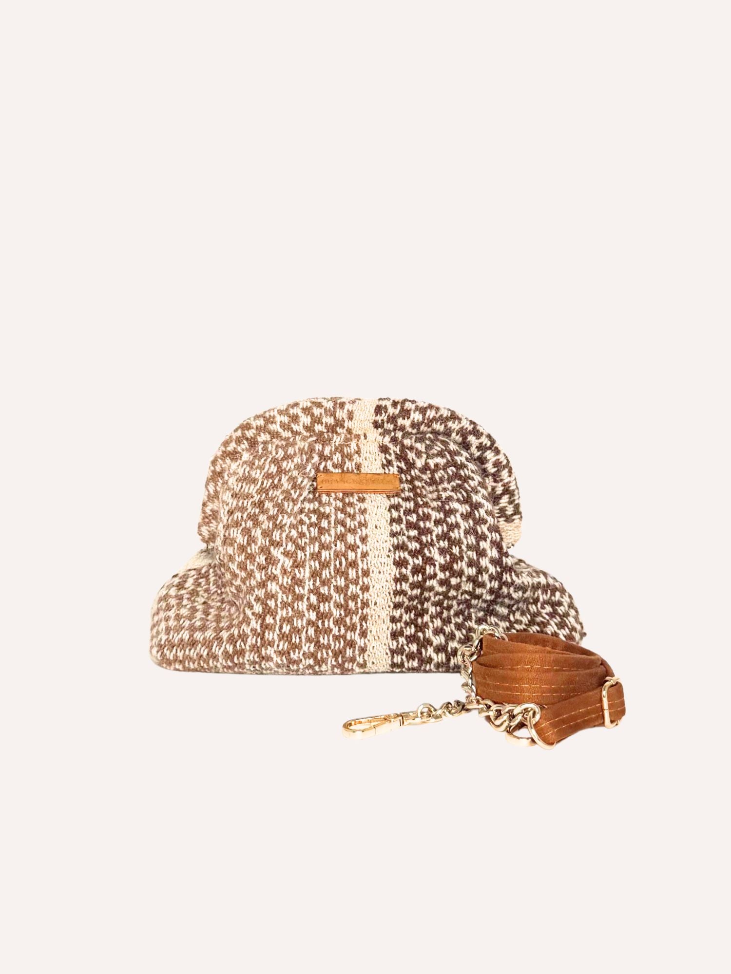 Side view of Luna alpaca kiss lock clutch – browns and ivory | Orange Inca