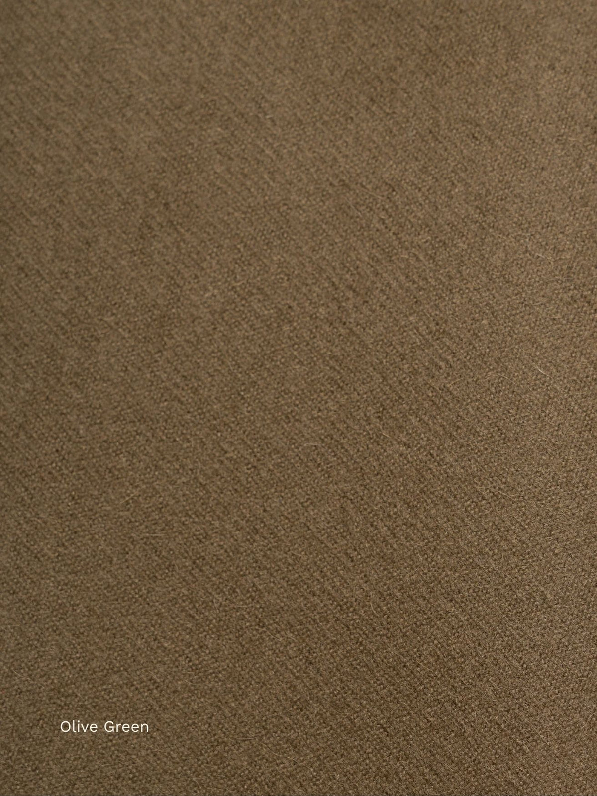 Olive green naturally dyed baby alpaca scarf, close-up of the earthy khaki fabric